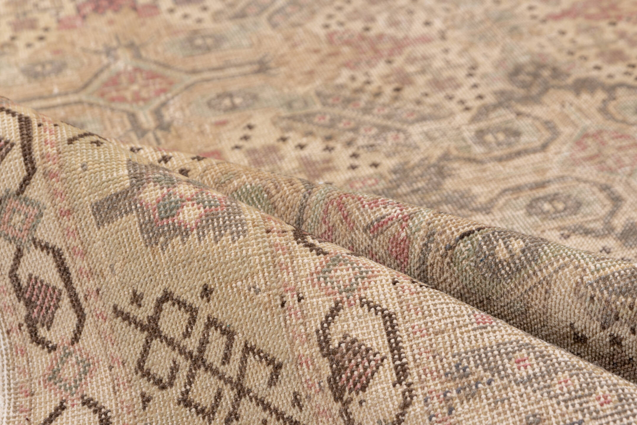 4' x 7' one-of-a-kind handmade vintage Kaisary rug. Color palette: brown, gray, pink