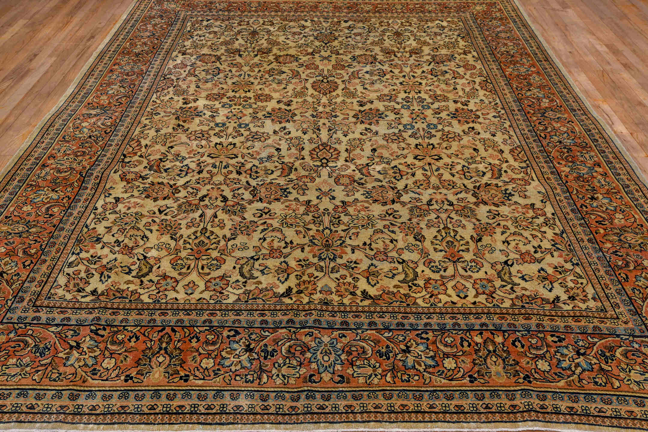8' x 11' one-of-a-kind handmade antique Sarouk large size rug. Color palette: ivory, rust, navy, soft blue, camel, taupe