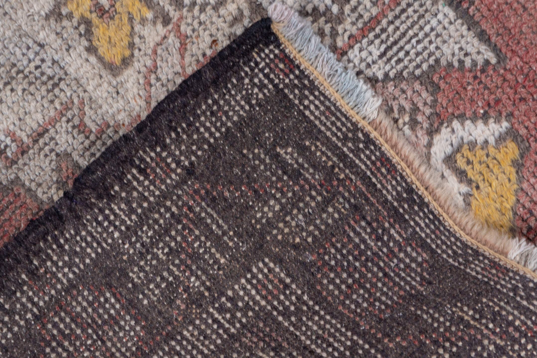 3' x 9' one-of-a-kind handmade vintage Oushak runner rug. Color palette: terra cotta, ivory, taupe, charcoal, gold, rose