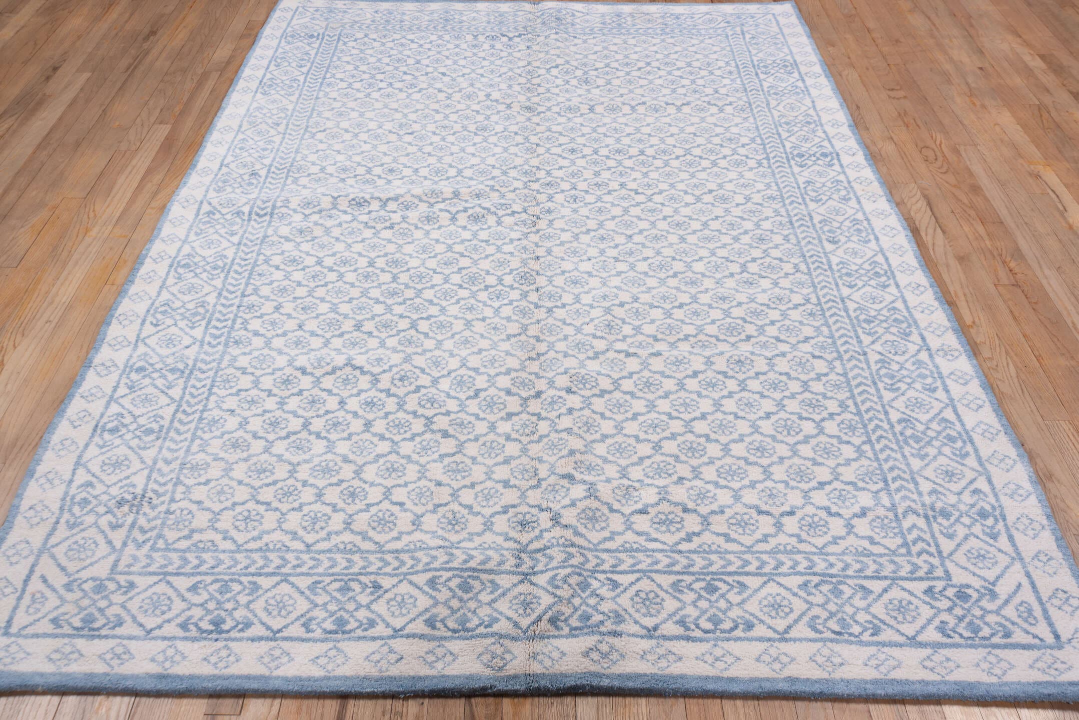 6' x 9' one-of-a-kind handmade vintage Cotton Agra medium size rug. Color palette: ivory, sky blue, powder blue, light blue