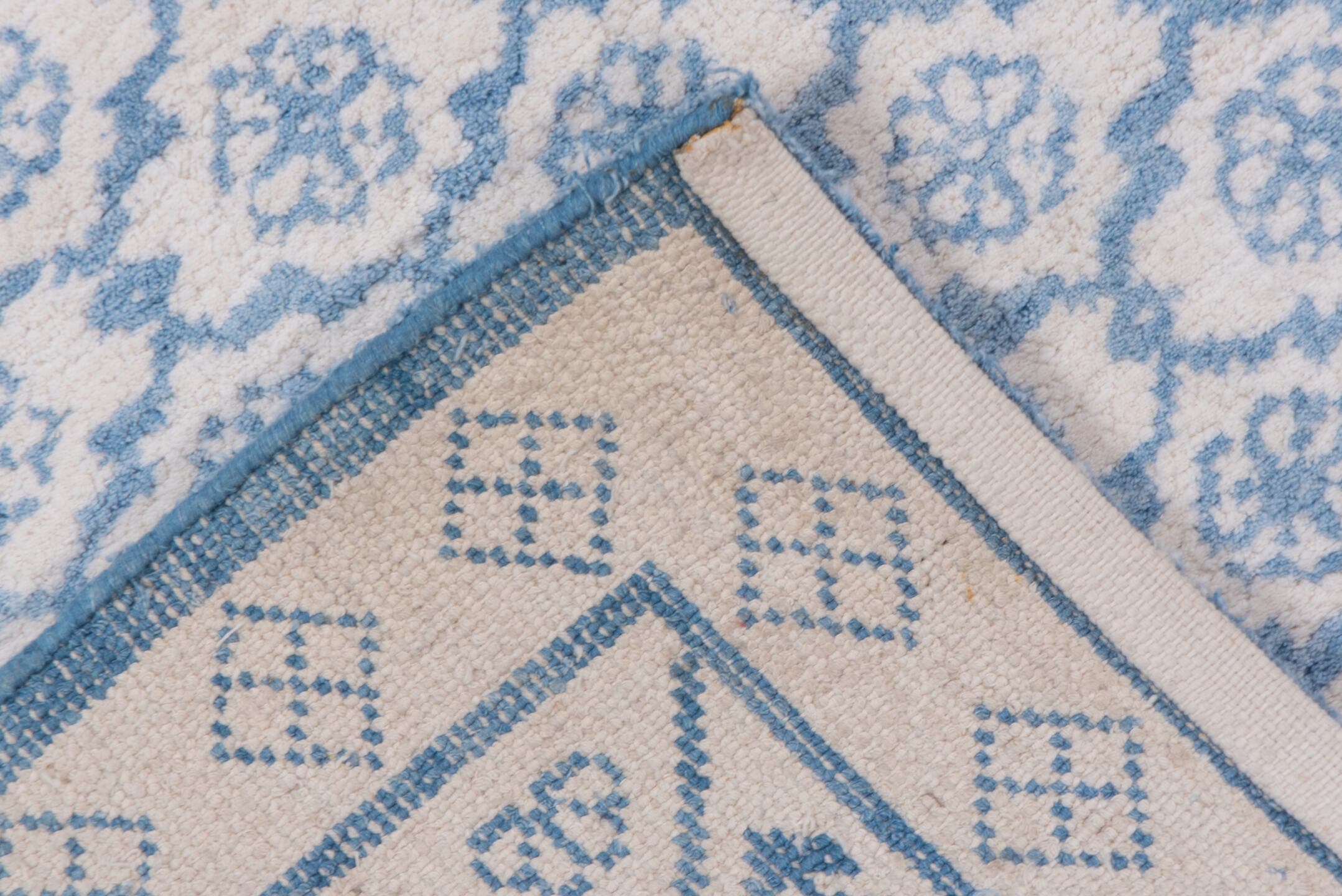 6' x 9' one-of-a-kind handmade vintage Cotton Agra medium size rug. Color palette: ivory, sky blue, powder blue, light blue