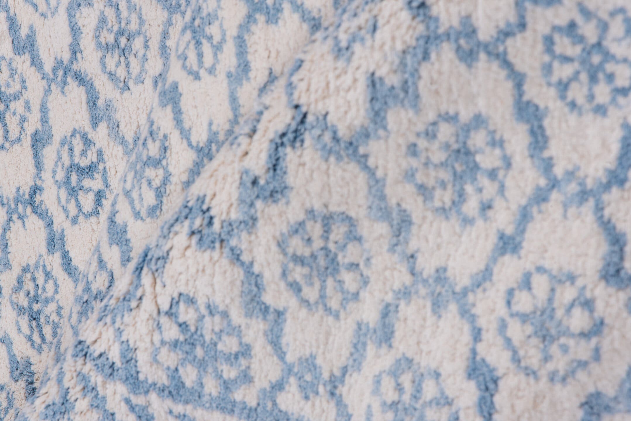 6' x 9' one-of-a-kind handmade vintage Cotton Agra medium size rug. Color palette: ivory, sky blue, powder blue, light blue