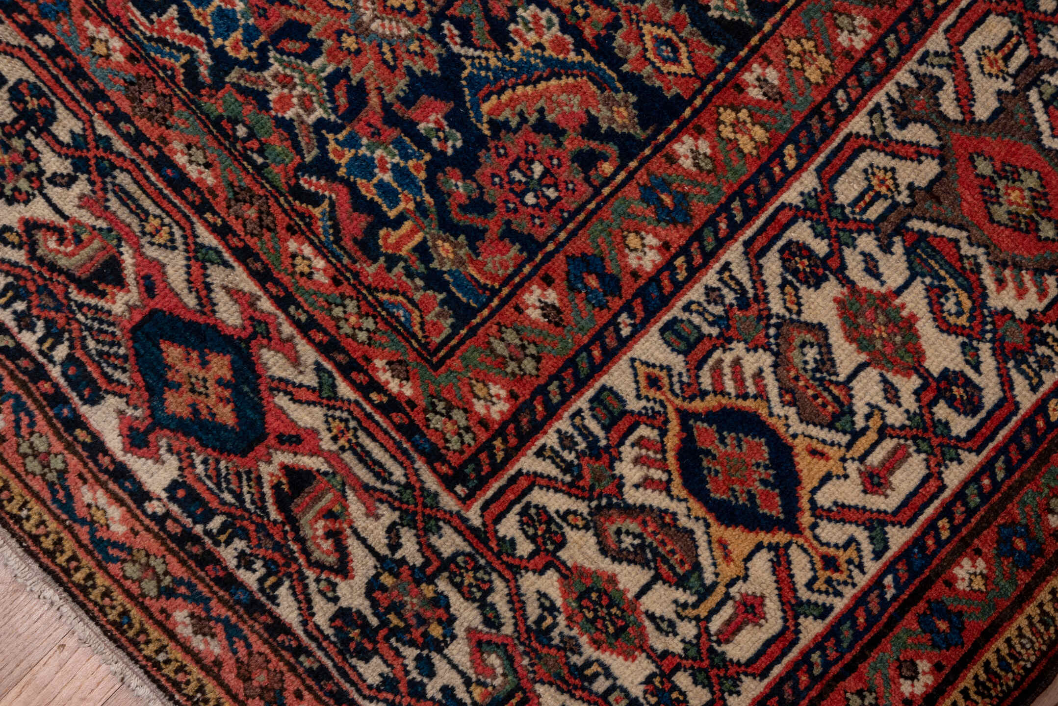 7' x 17' one-of-a-kind handmade antique Mahal rug. Color palette: navy, rust, ivory, coral, indigo, camel, burgundy, blue