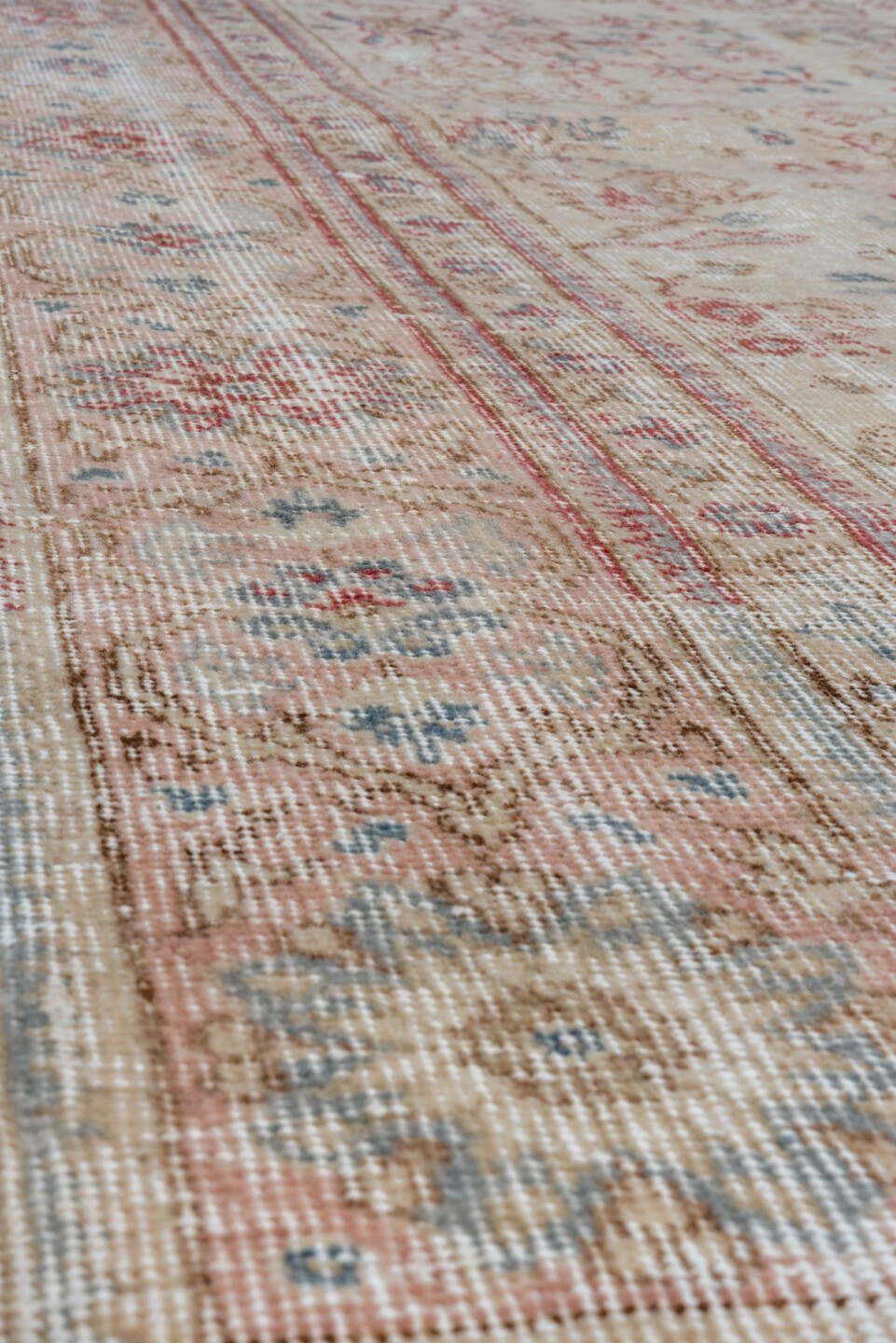6' x 10' one-of-a-kind handmade vintage Oushak large size rug. Color palette: ivory, blush, pale blue, rust, beige, rose
