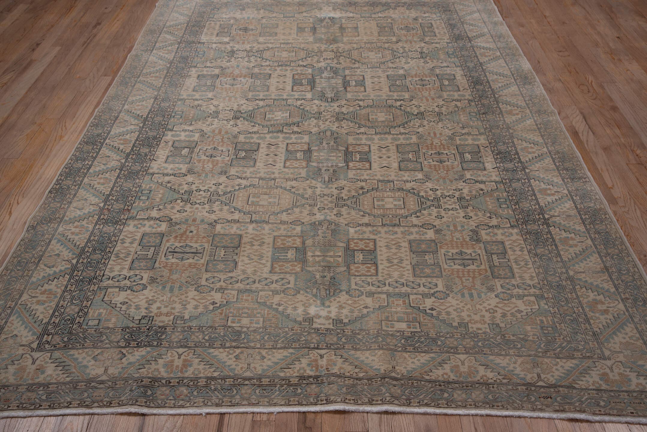 6' x 9' one-of-a-kind handmade vintage Kaisary medium size rug. Color palette: ivory, pale blue, taupe, beige, slate, camel
