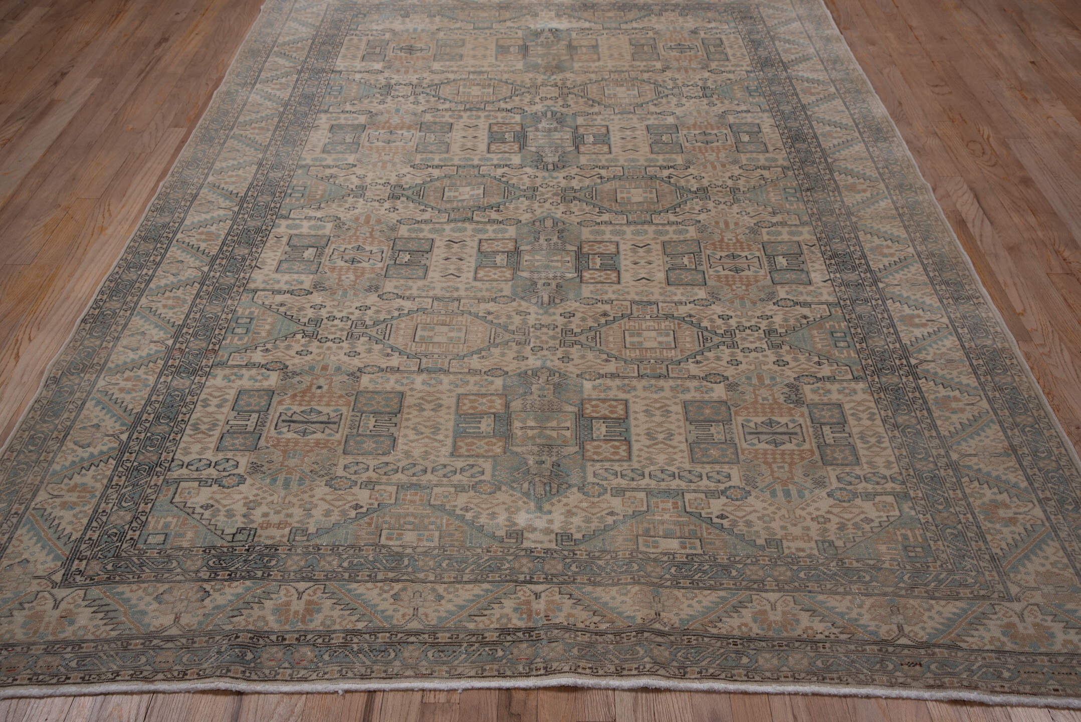 6' x 9' one-of-a-kind handmade vintage Kaisary medium size rug. Color palette: ivory, pale blue, taupe, beige, slate, camel