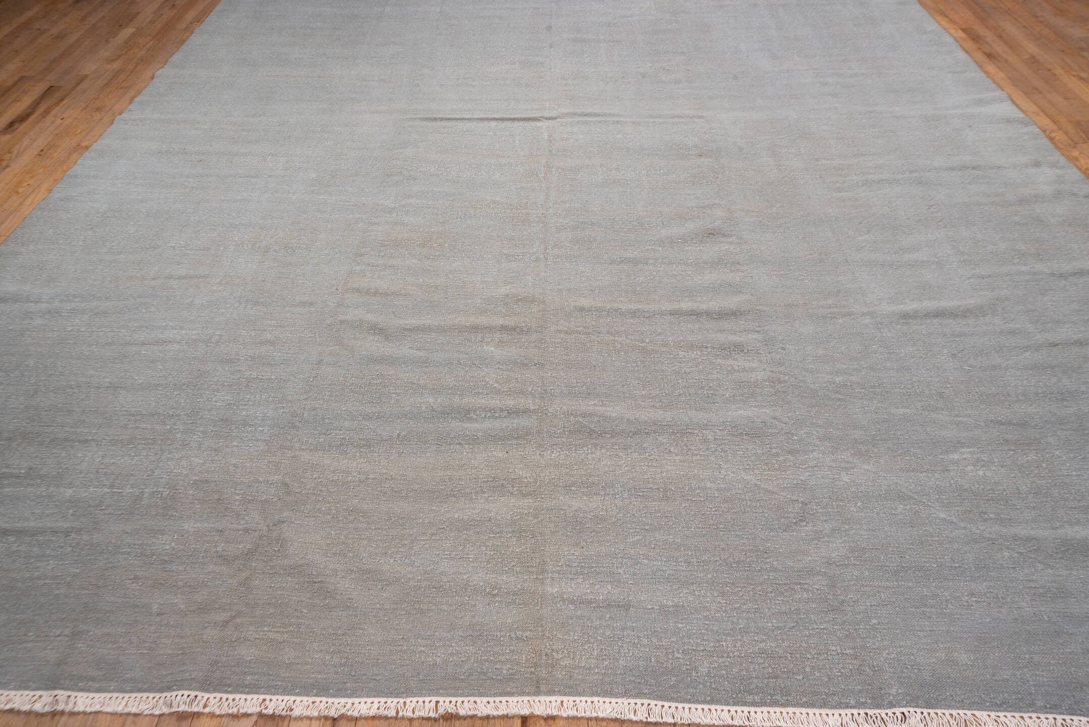 11' x 14' one-of-a-kind handmade vintage Dhurrie oversize rug. Color palette: pale blue, silver, ivory, light blue, gray