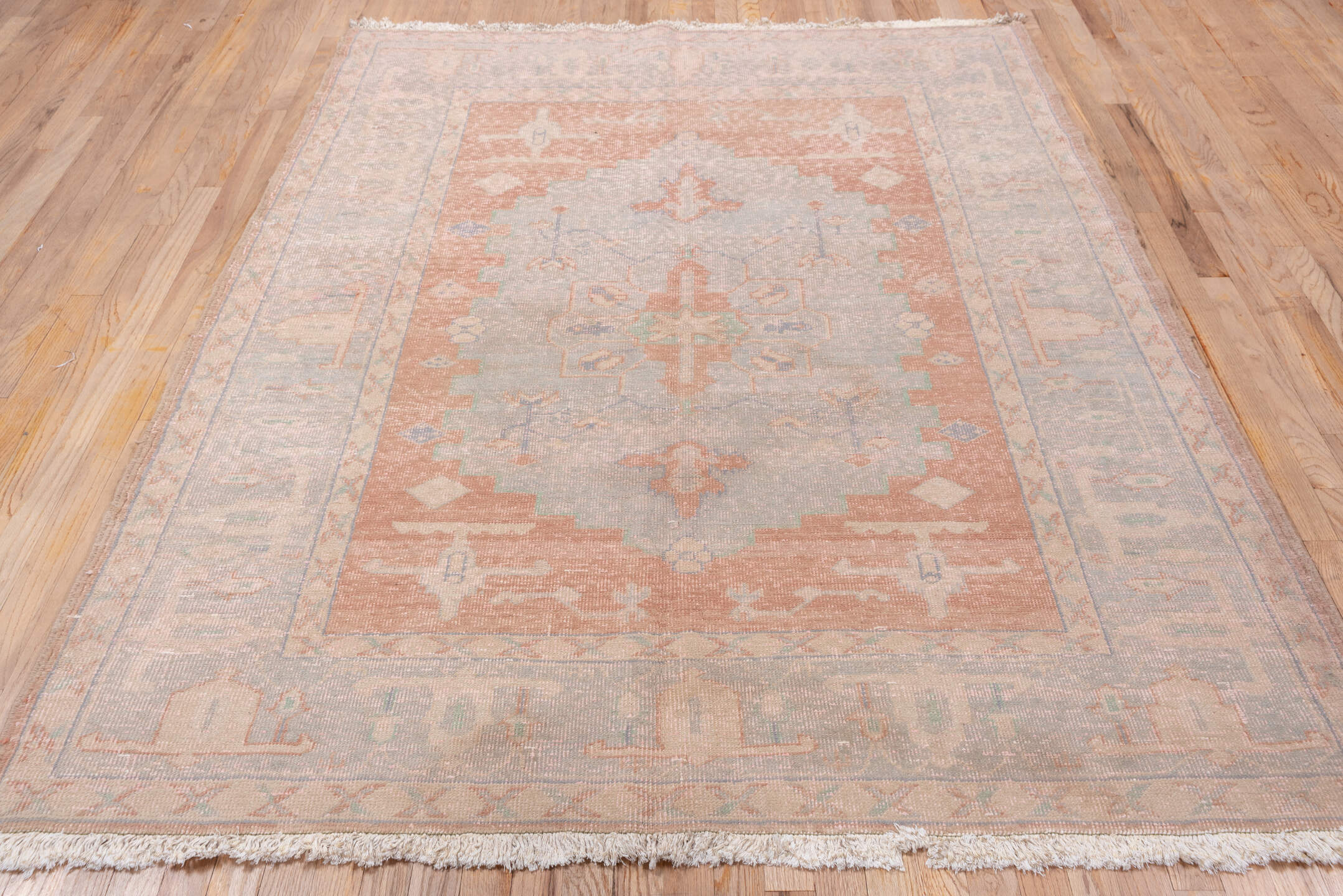 5' x 7' one-of-a-kind handmade vintage Oushak medium size rug. Color palette: blush, dusty rose, pale blue, ivory, taupe