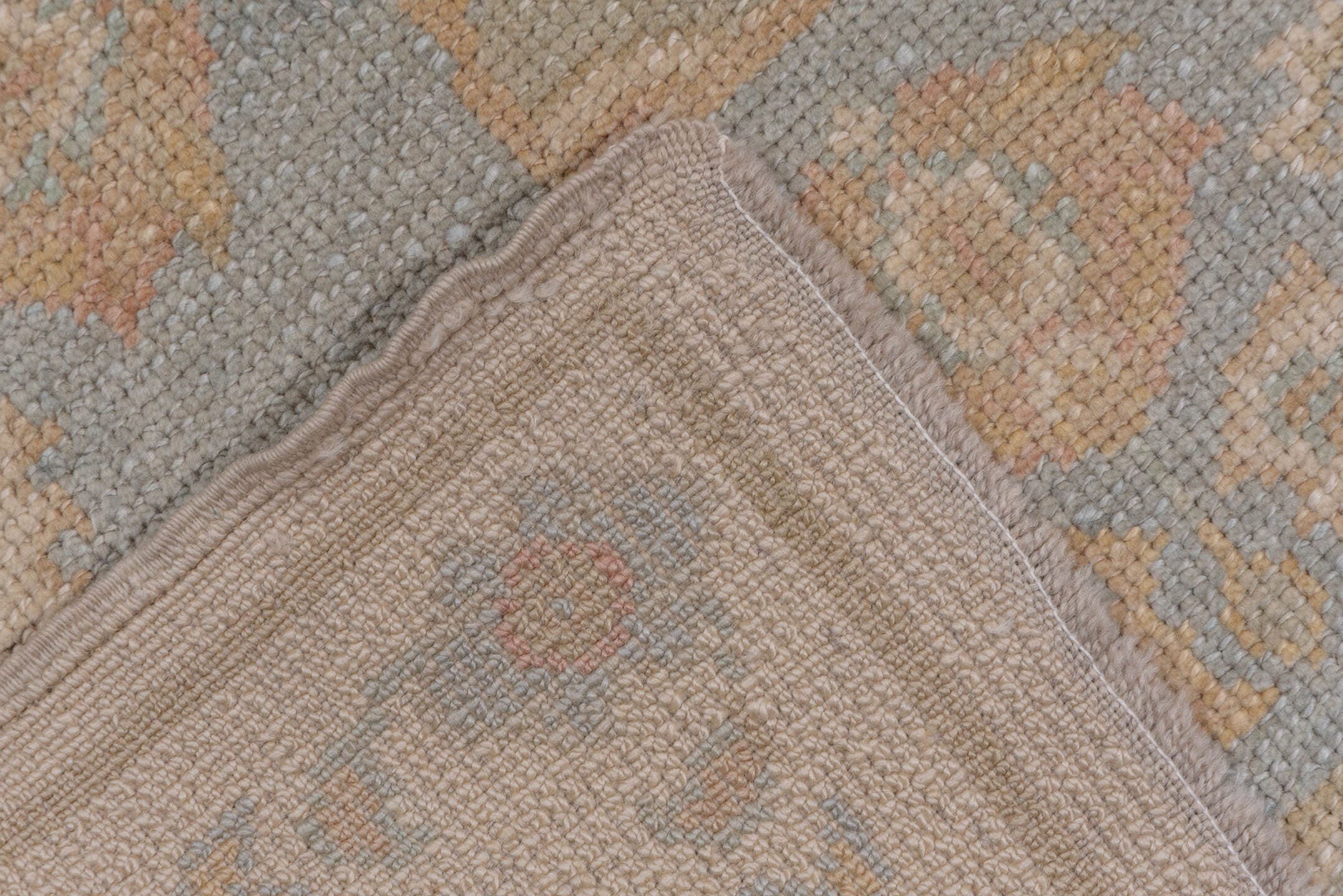 9' x 12' one-of-a-kind handmade vintage Oushak large size rug. Color palette: ivory, pale blue, taupe, gold, beige, sage