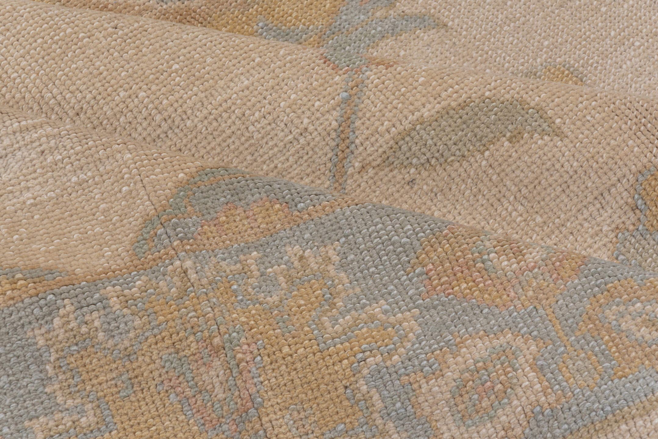 9' x 12' one-of-a-kind handmade vintage Oushak large size rug. Color palette: ivory, pale blue, taupe, gold, beige, sage