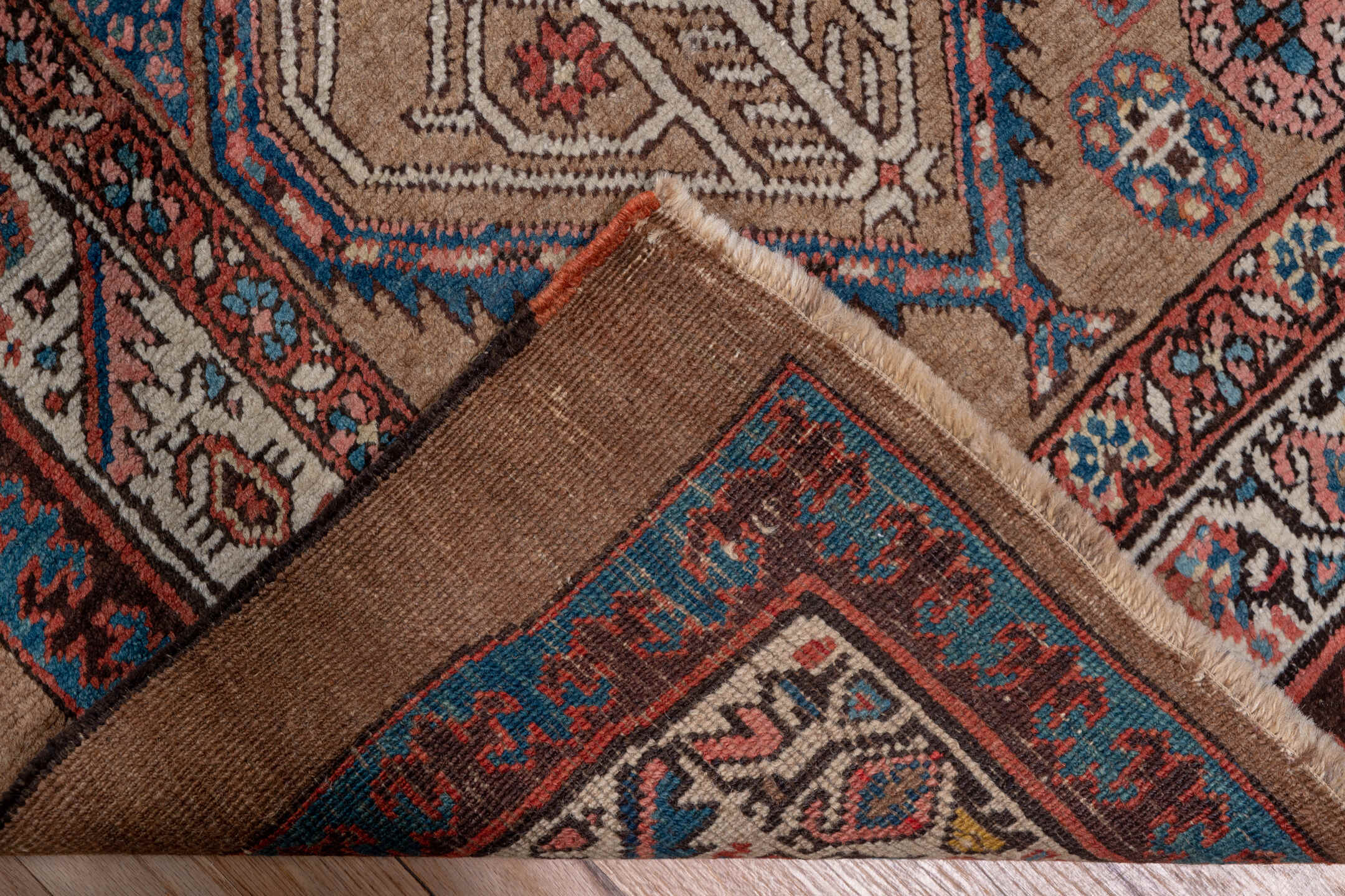 3' x 18' one-of-a-kind handmade vintage Serapi runner rug. Color palette: taupe, rust, ivory, blue, brown, slate, beige