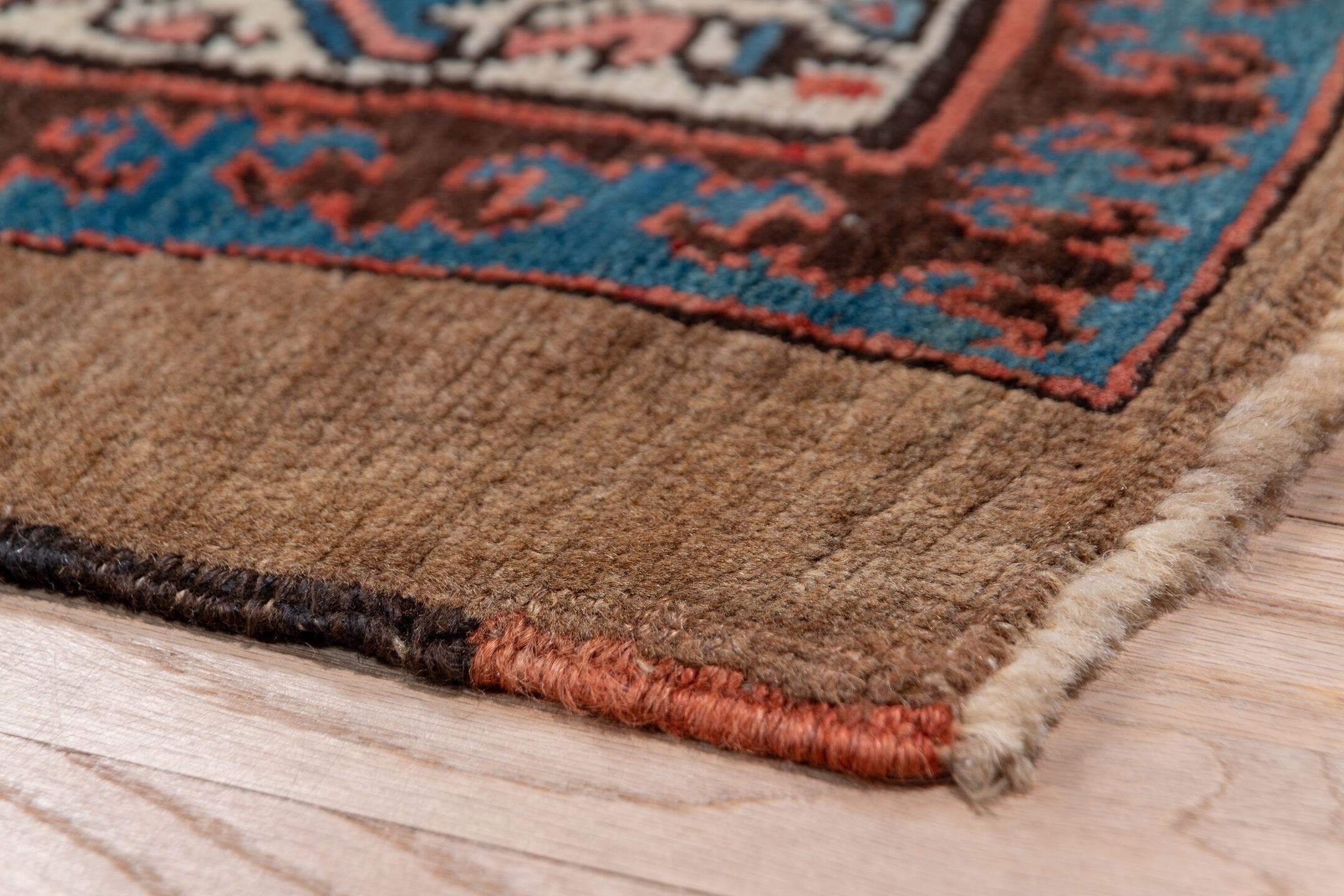3' x 18' one-of-a-kind handmade vintage Serapi runner rug. Color palette: taupe, rust, ivory, blue, brown, slate, beige