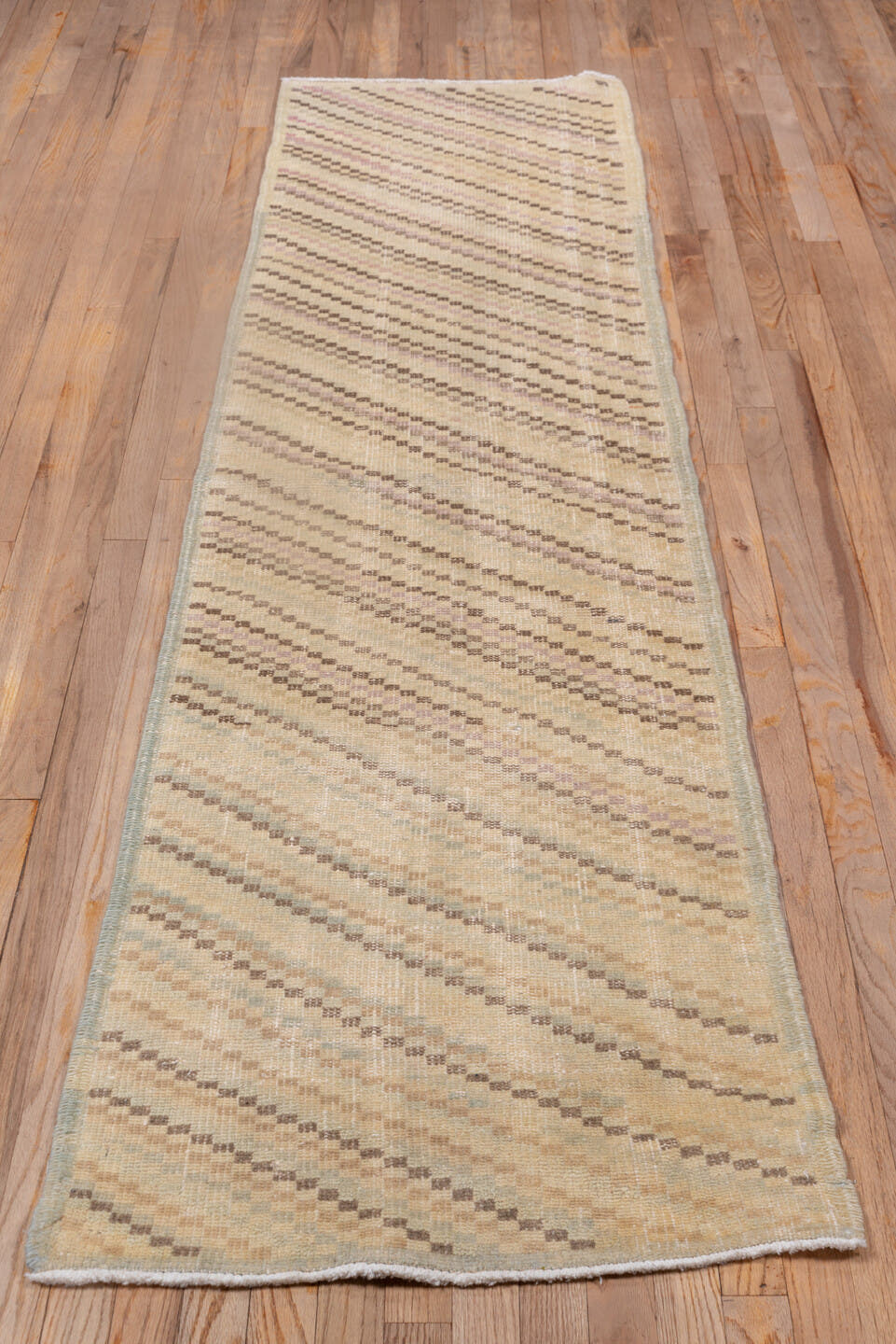 2' x 9' one-of-a-kind handmade vintage Oushak runner rug. Color palette: ivory, cream, taupe, blush, beige, gray, pink