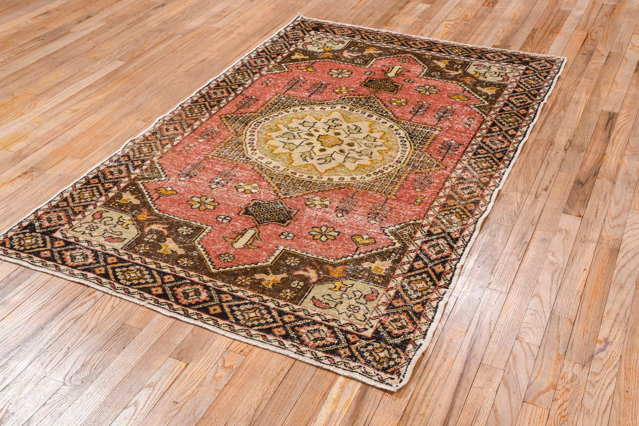 4' x 6' one-of-a-kind handmade vintage Oushak small size rug. Color palette: coral, brown, ivory, charcoal, gold, rose