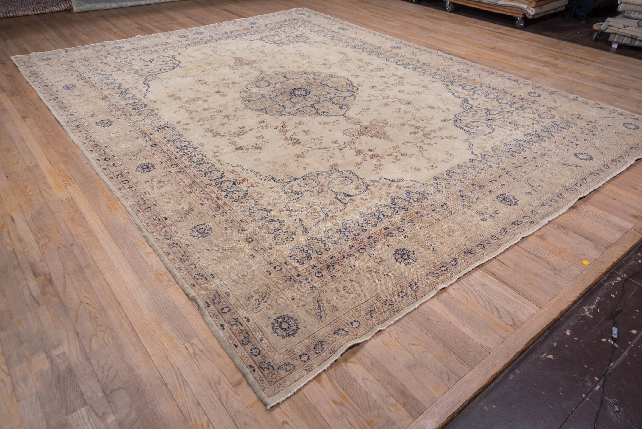 11' x 14' one-of-a-kind handmade antique Oushak oversize rug. Color palette: ivory, beige, pale blue, taupe, sand
