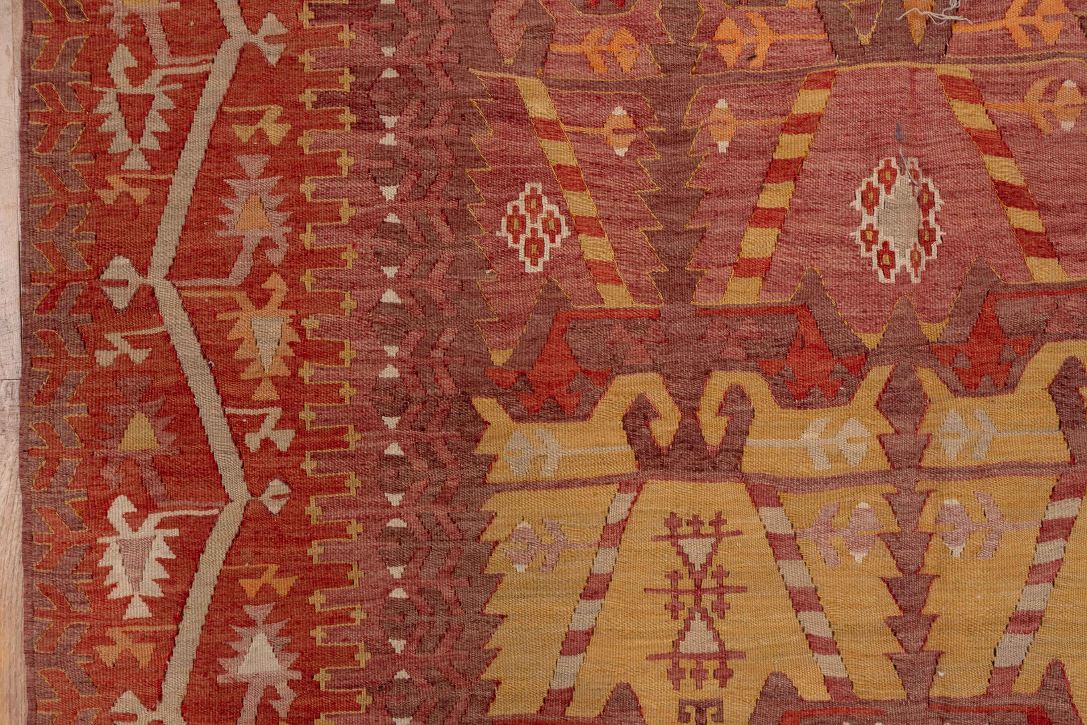 4' x 12' one-of-a-kind handmade vintage Kilim runner rug. Color palette: brown, red, redwood