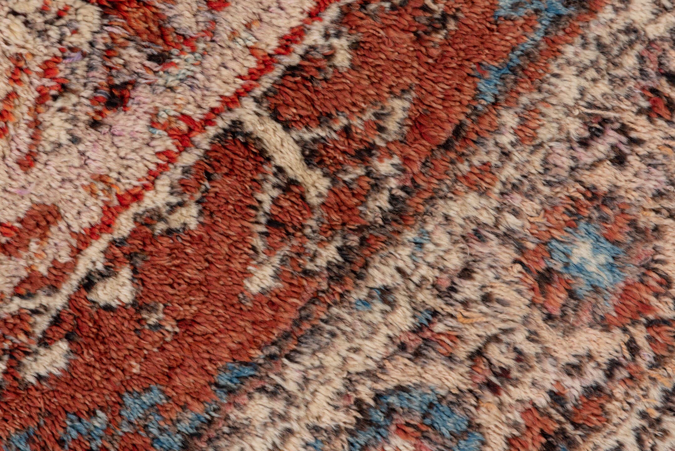 4' x 5' one-of-a-kind handmade vintage Tulu small size rug. Color palette: ivory, rust, charcoal, soft blue, terracotta
