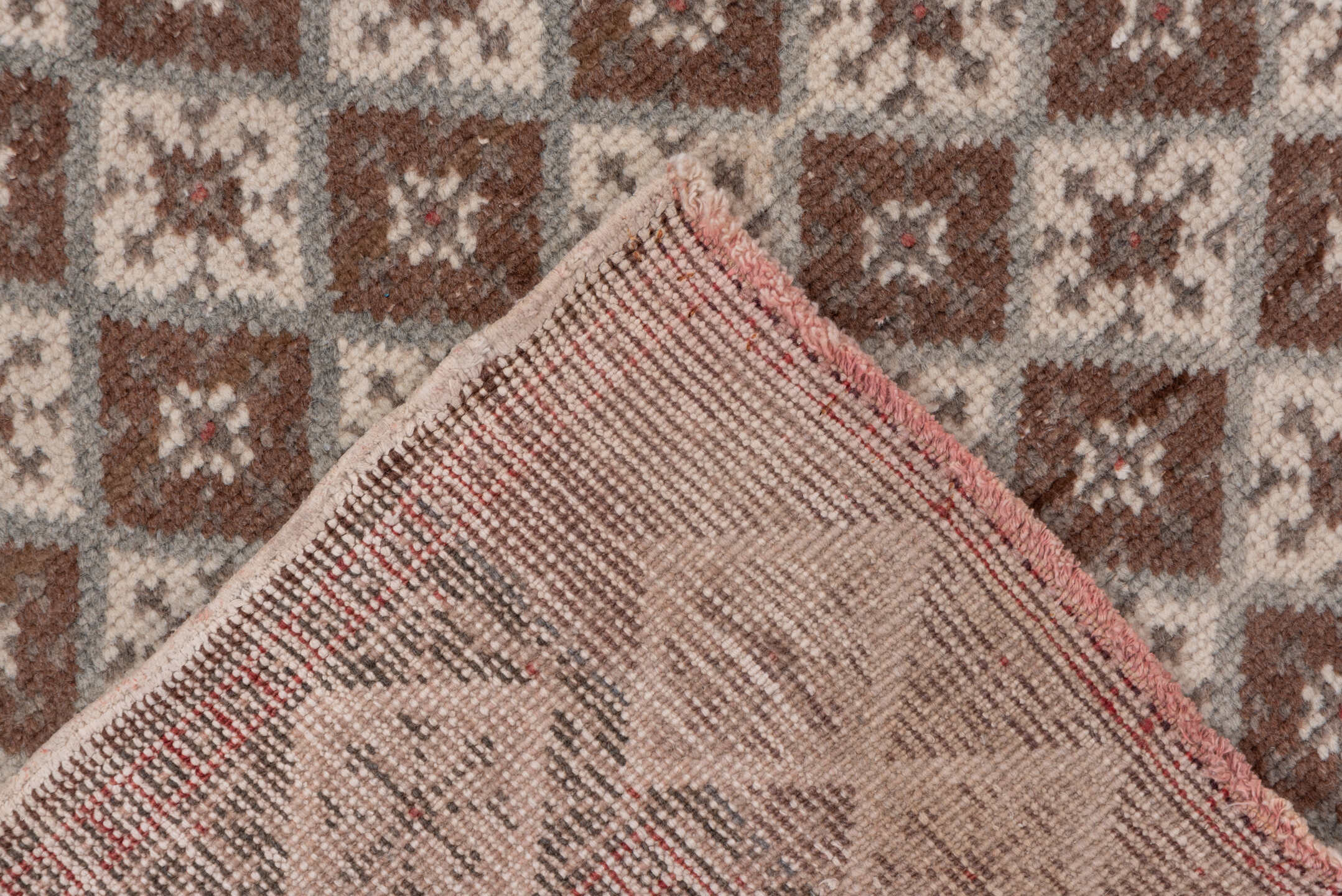 3' x 9' one-of-a-kind handmade vintage Oushak runner rug. Color palette: brown, gray, light gray, off-white, pink