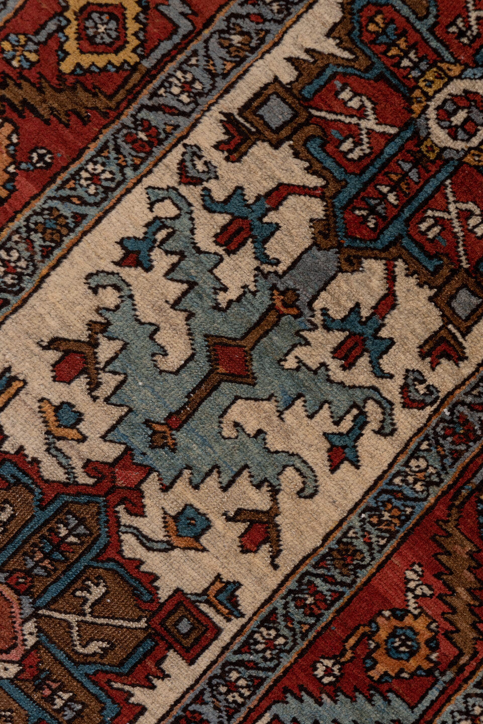 3' x 17' one-of-a-kind handmade vintage Serapi runner rug. Color palette: rust, ivory, sky blue, navy, camel, brown