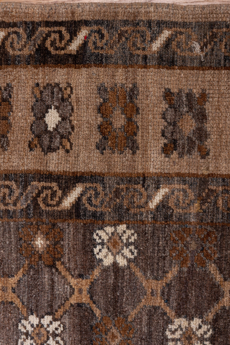 7' x 11' one-of-a-kind handmade antique Kars large size rug. Color palette: taupe, brown, camel, ivory, charcoal, beige