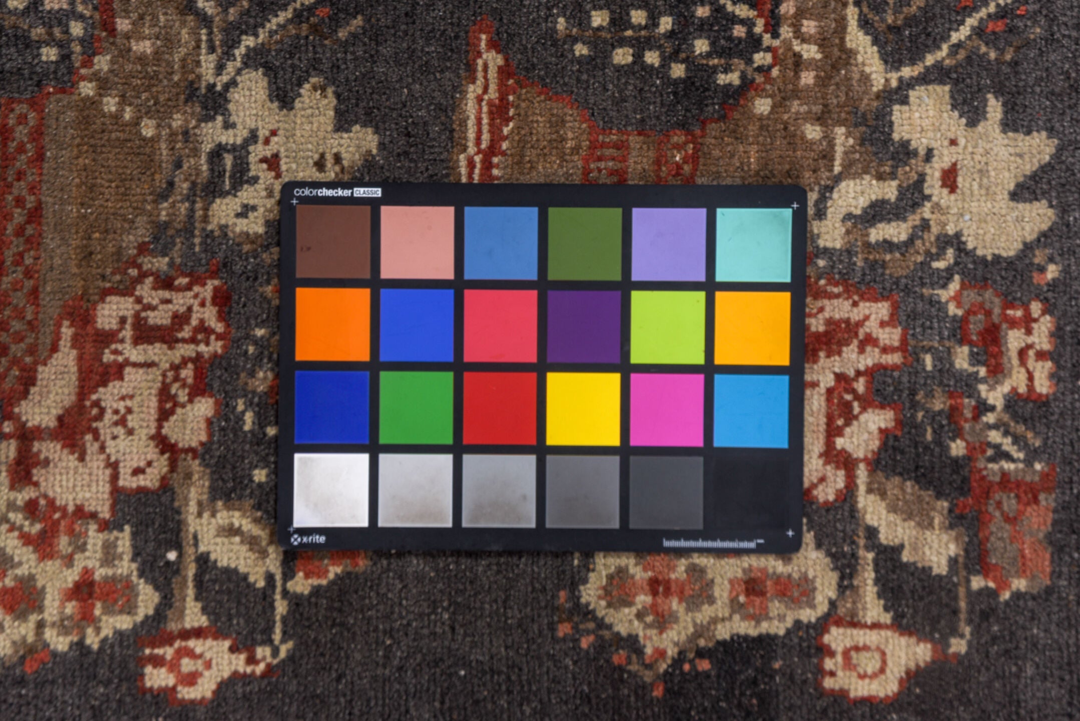 2' x 8' one-of-a-kind handmade vintage Oushak runner rug. Color palette: black, brown, charcoal, gray, off-white, pink, red