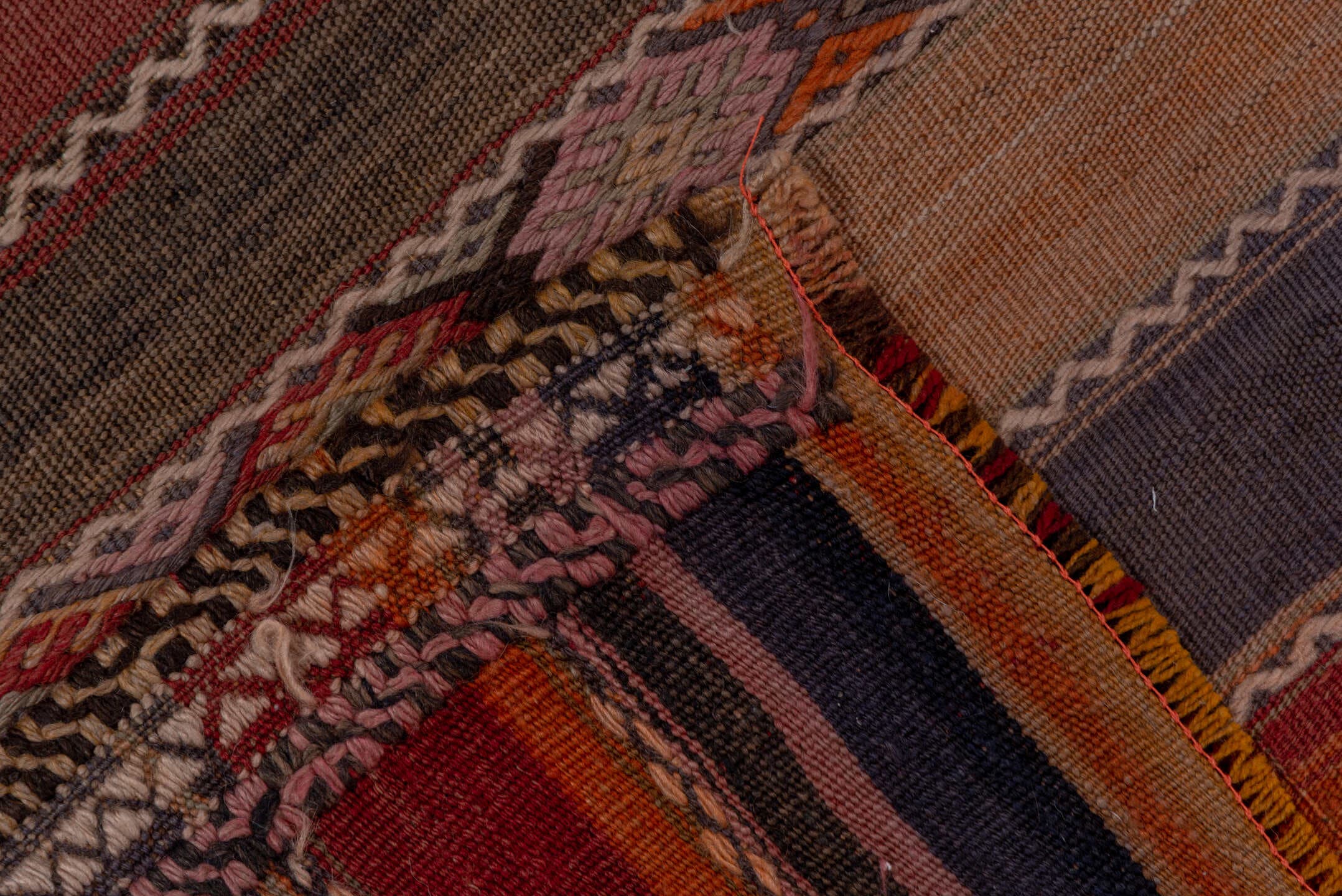 4' x 10' one-of-a-kind handmade vintage Jijim runner rug. Color palette: rust, rose, taupe, brown, charcoal, terracotta