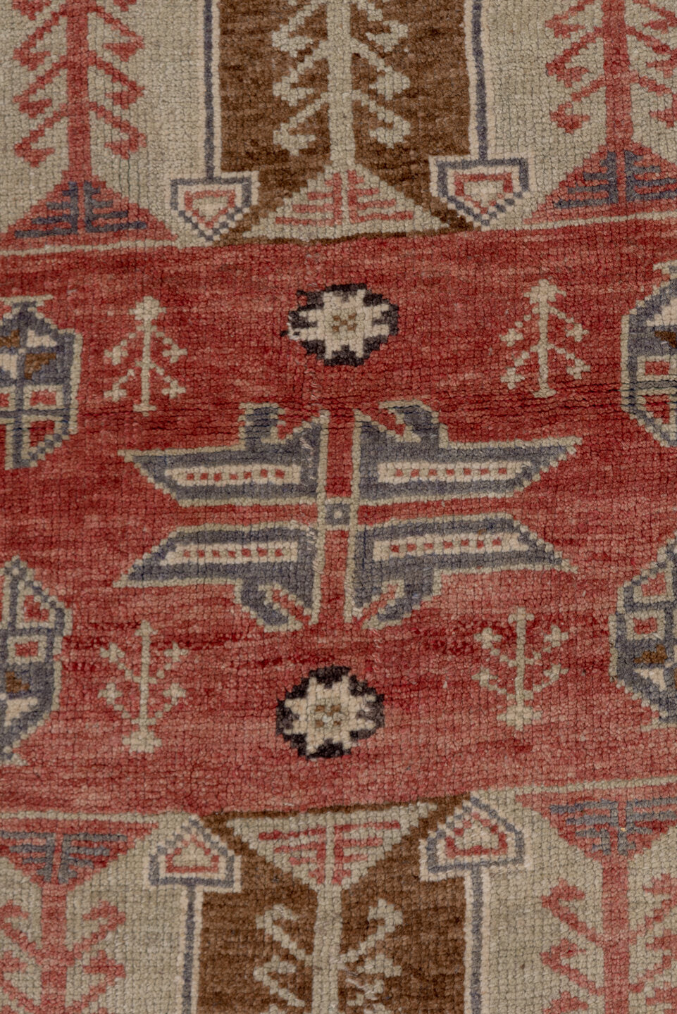 4' x 8' one-of-a-kind handmade vintage Konya runner rug. Color palette: brown, gray, pink, red