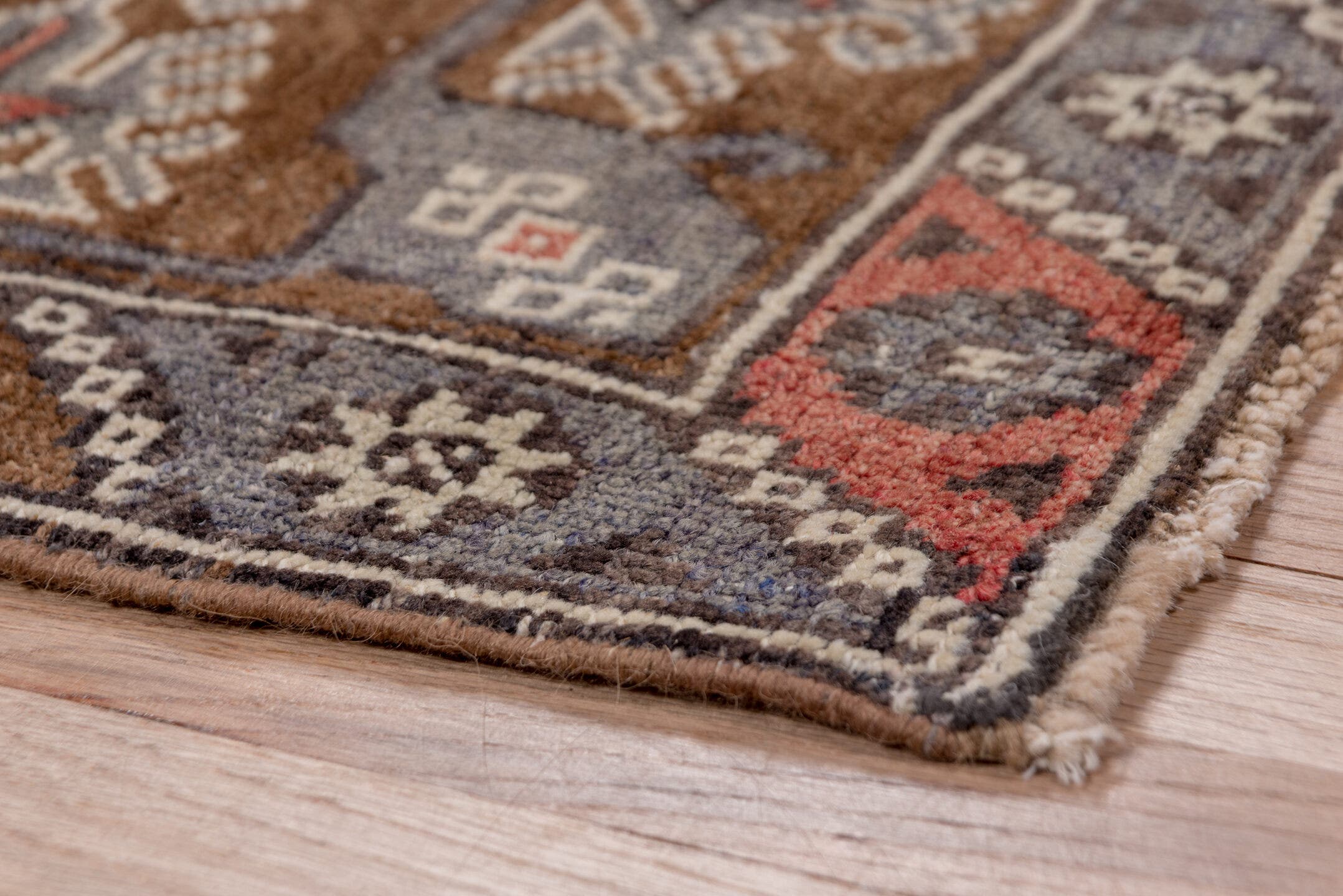 4' x 8' one-of-a-kind handmade antique Konya runner rug. Color palette: brown, coral, ivory, indigo, rust, taupe, slate