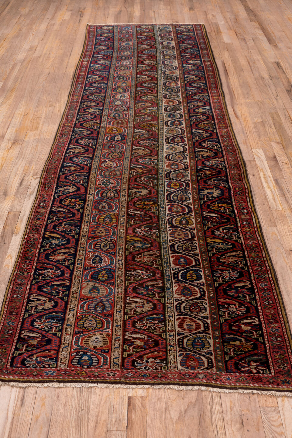 3' x 12' one-of-a-kind handmade vintage Bidjar runner rug. Color palette: blue, brown, gray, pink, red