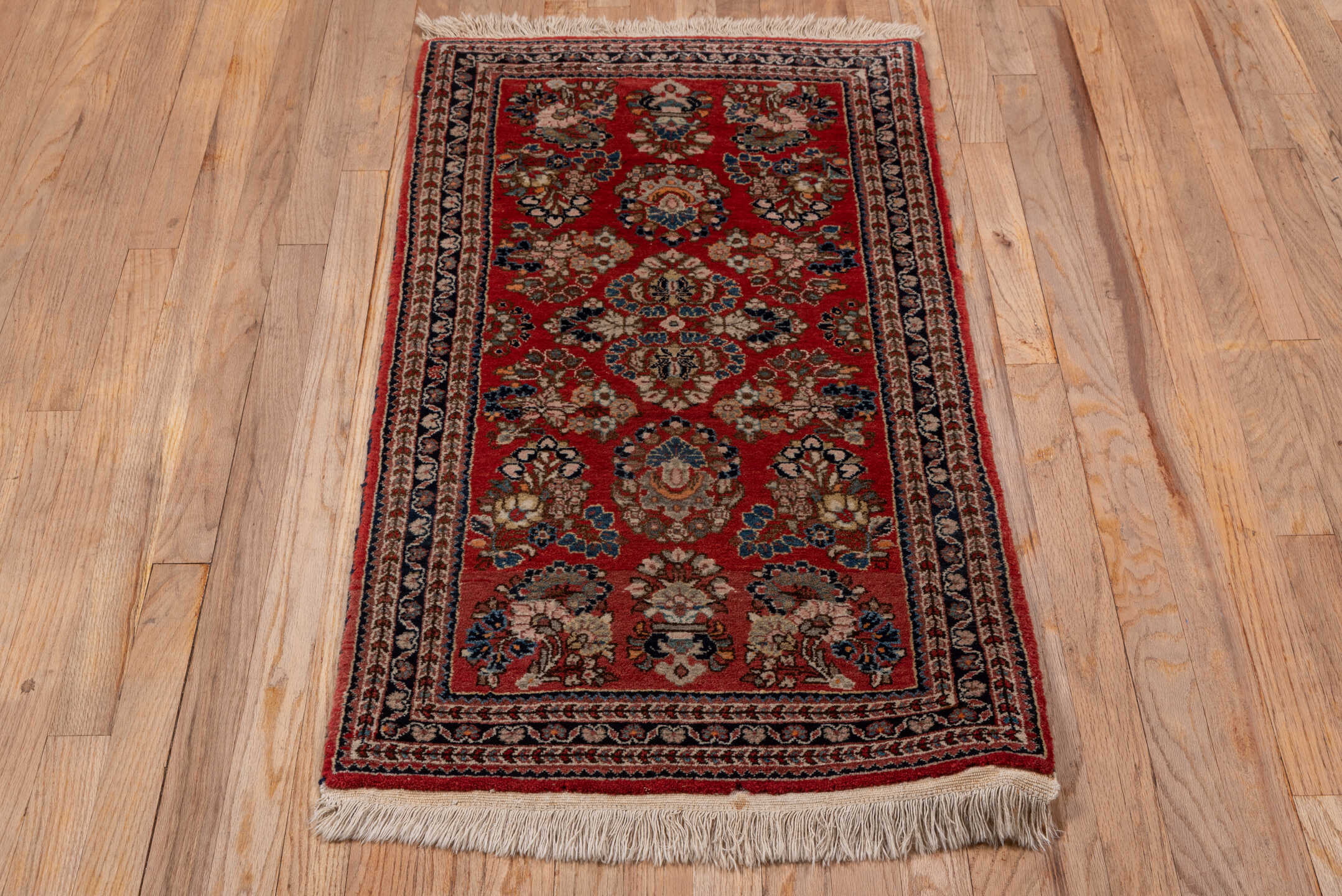 2' x 4' one-of-a-kind handmade antique Sarouk small size rug. Color palette: red, navy, ivory, camel, rose, slate, brown