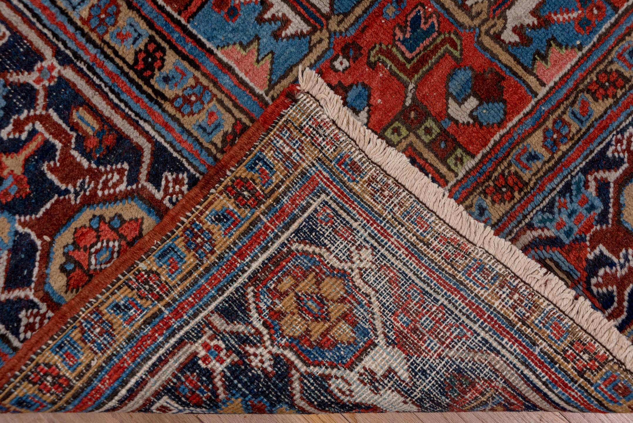 8' x 11' one-of-a-kind handmade antique Heriz large size rug. Color palette: rust, navy, ivory, sky blue, slate, camel