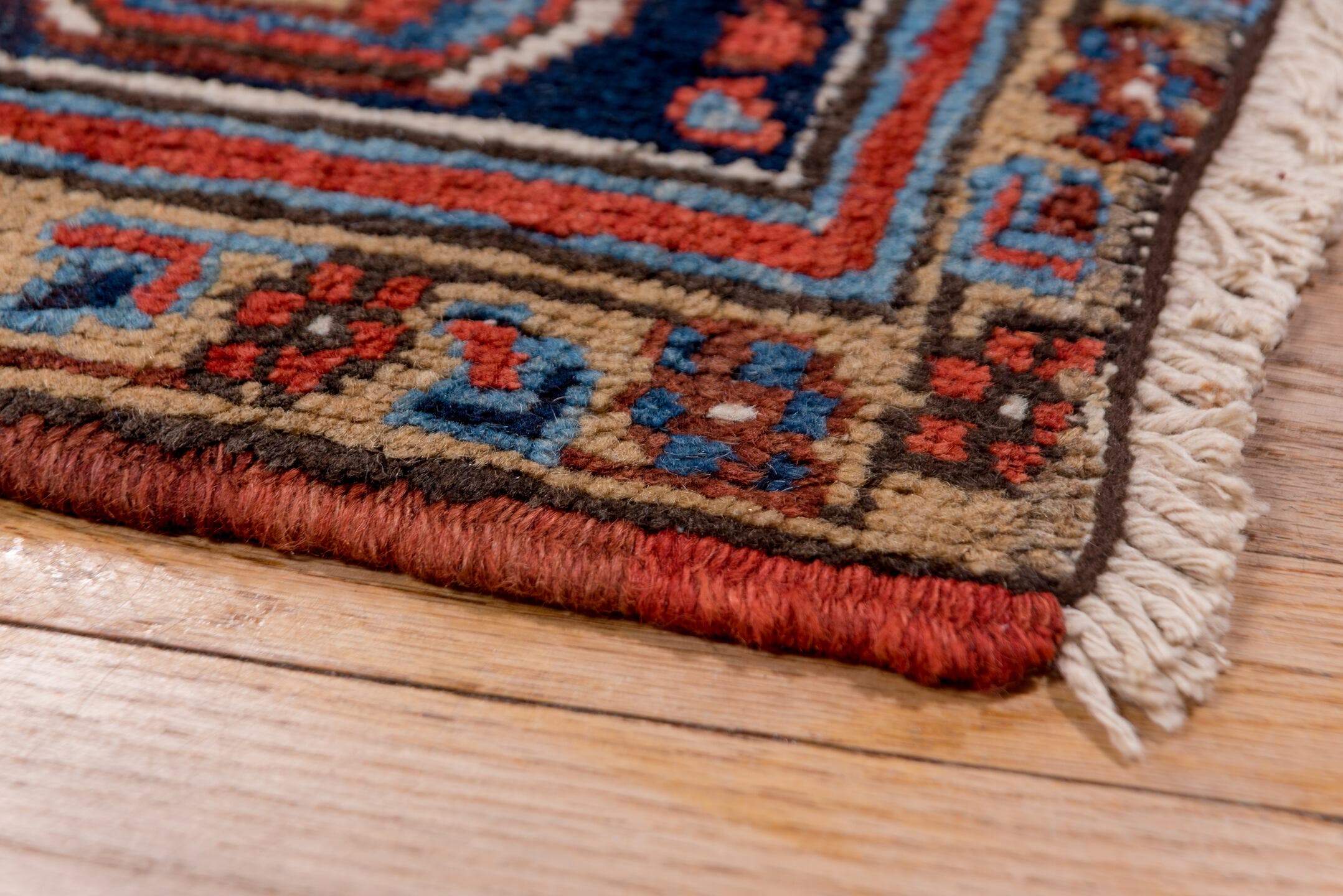 8' x 11' one-of-a-kind handmade antique Heriz large size rug. Color palette: rust, navy, ivory, sky blue, slate, camel