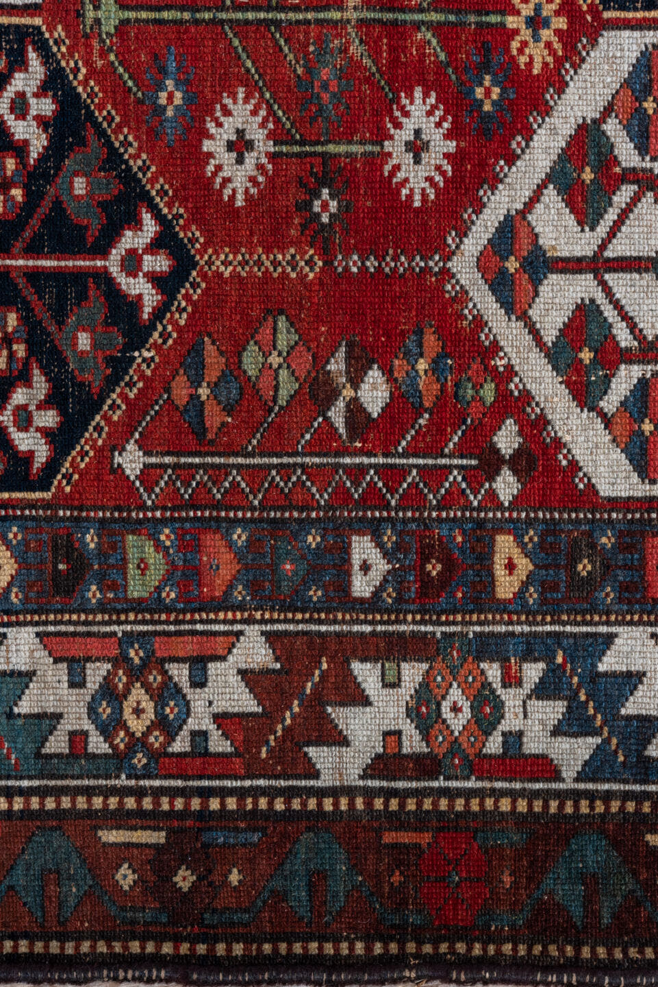 4' x 6' one-of-a-kind handmade antique Baktiary small size rug. Color palette: rust, ivory, navy, slate, burgundy, camel