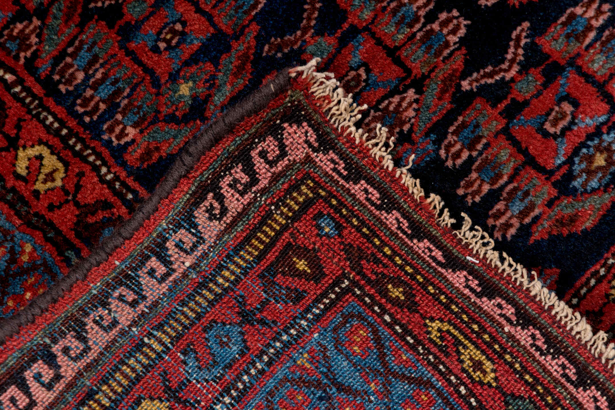 3' x 6' one-of-a-kind handmade vintage Kurd small size rug. Color palette: blue, brown, gray, off-white, pink, red, snow