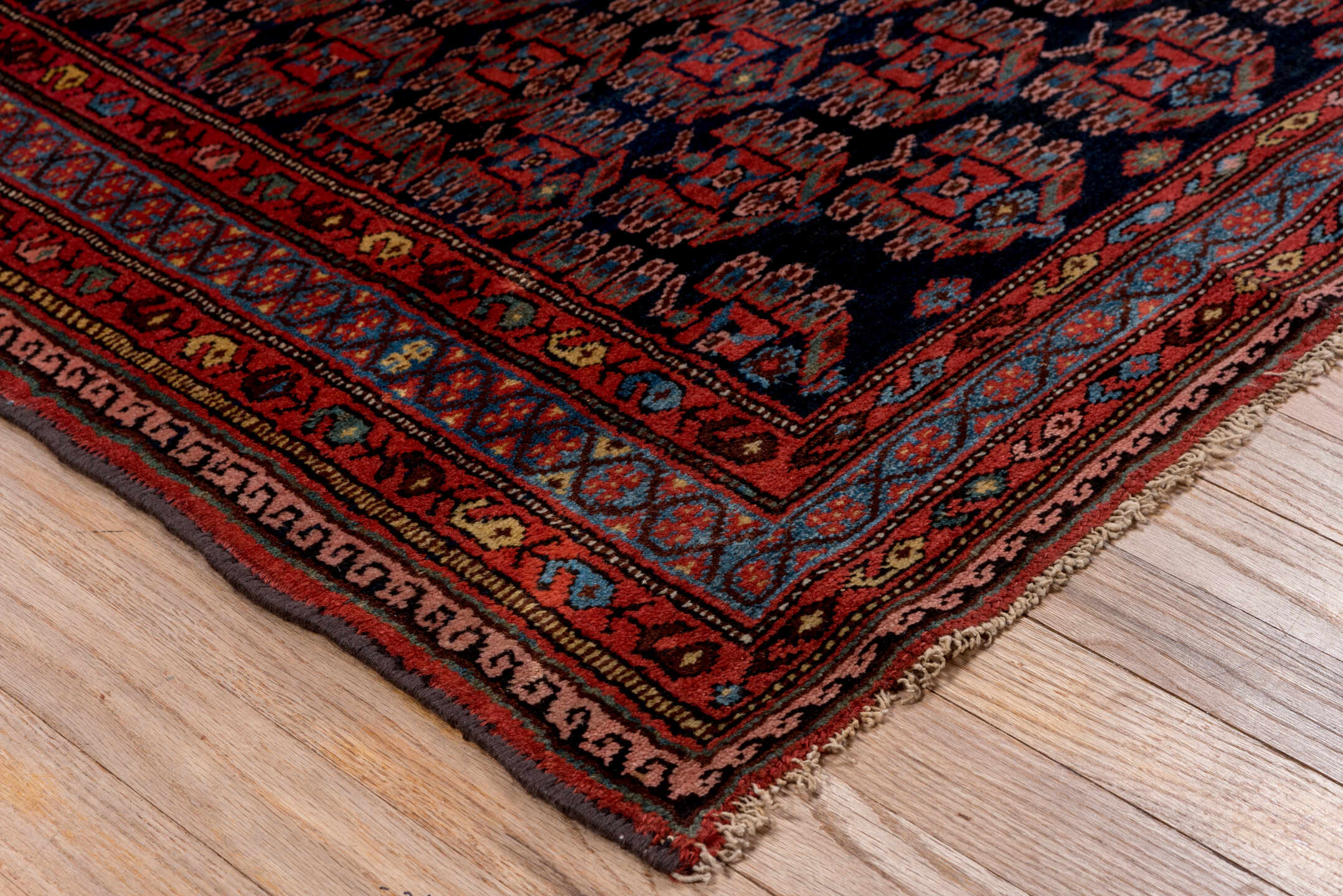3' x 6' one-of-a-kind handmade antique Kurd small size rug. Color palette: navy, rust, brick, sky blue, crimson, ivory