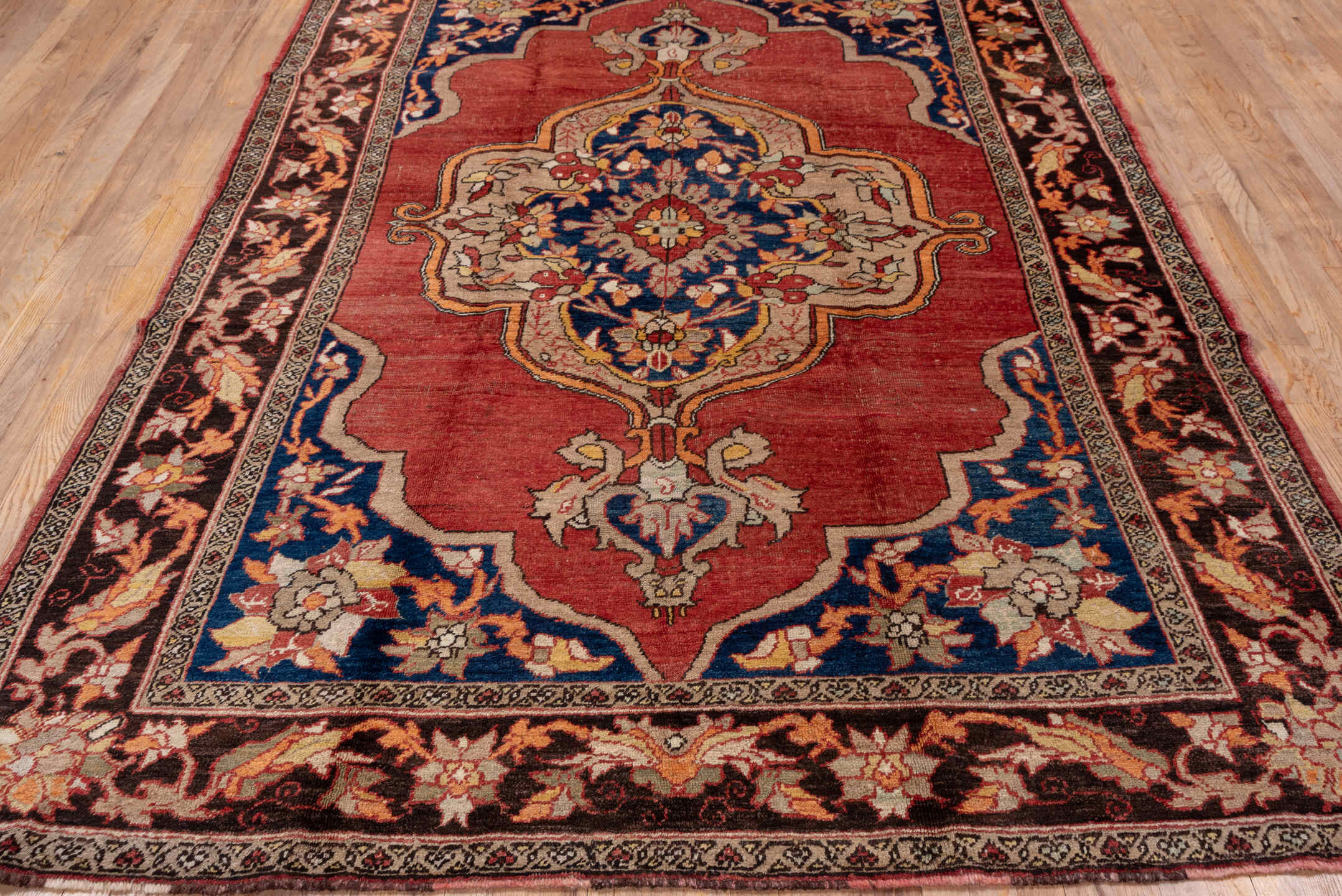 6' x 10' one-of-a-kind handmade vintage Oushak large size rug. Color palette: terra cotta, navy, ivory, burgundy, rose, gold