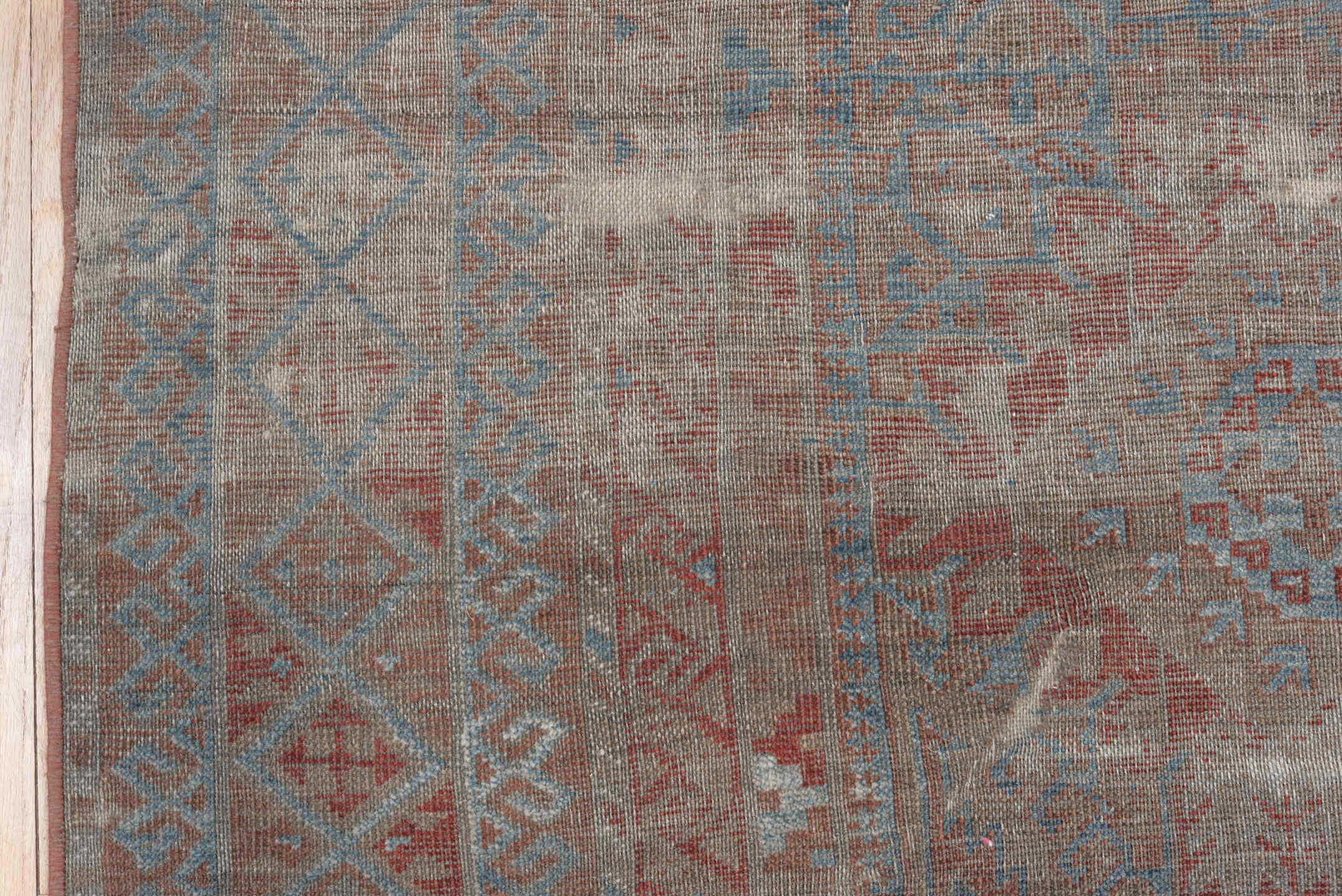5' x 10' one-of-a-kind handmade vintage Belouch runner rug. Color palette: taupe, ivory, sky blue, rust, brown, camel