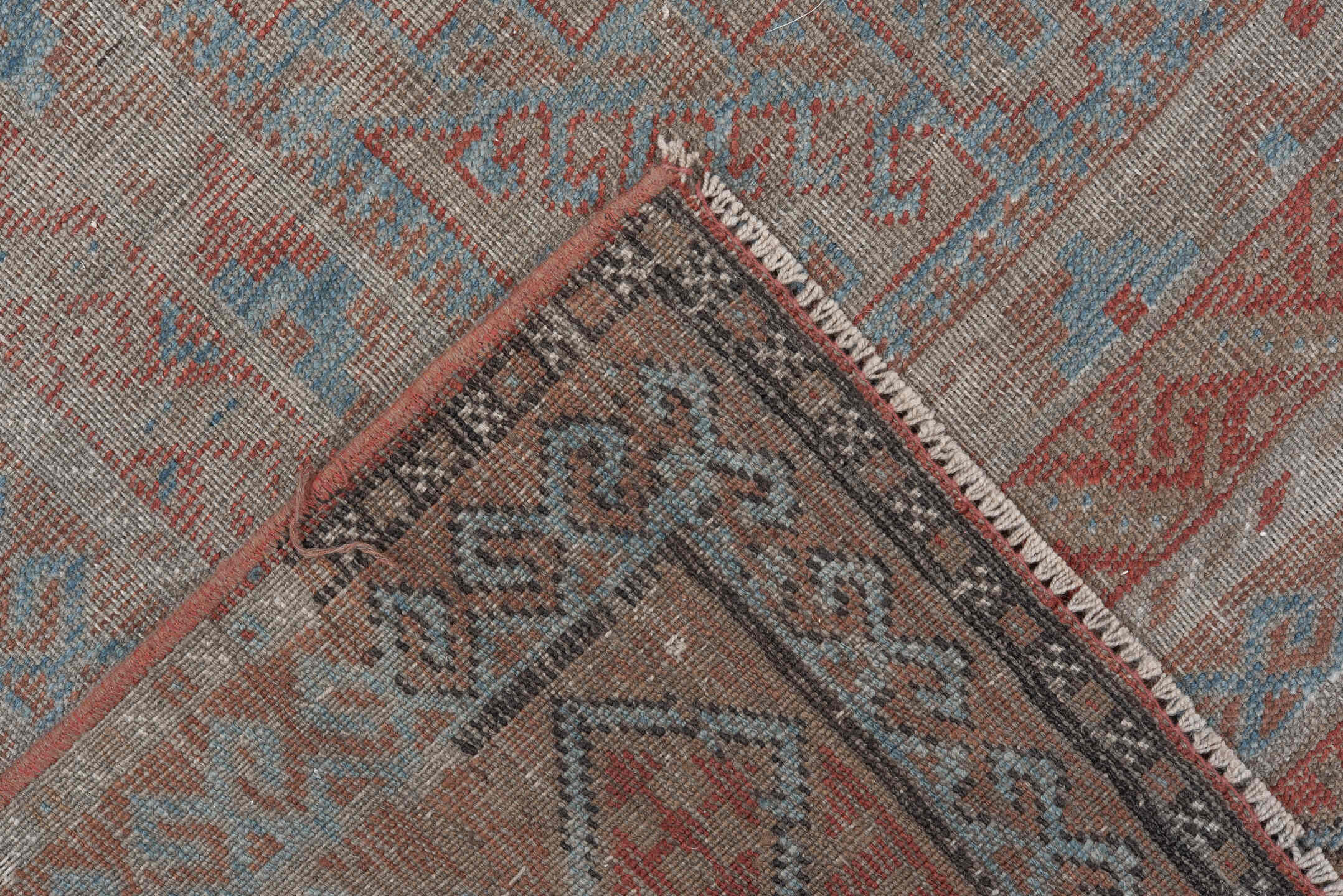 5' x 10' one-of-a-kind handmade vintage Belouch runner rug. Color palette: taupe, ivory, sky blue, rust, brown, camel