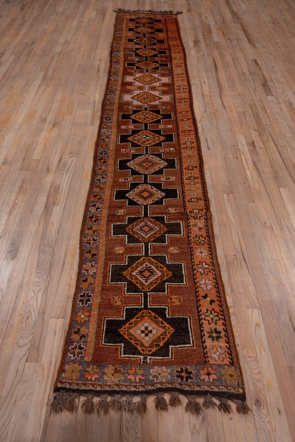 2' x 13' one-of-a-kind handmade vintage Kars runner rug. Color palette: terra cotta, brown, taupe, camel, charcoal, ivory