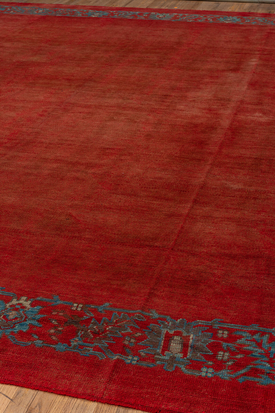 12' x 16' one-of-a-kind handmade antique Oushak oversize rug. Color palette: rust, terra cotta, slate, blue, brick, taupe