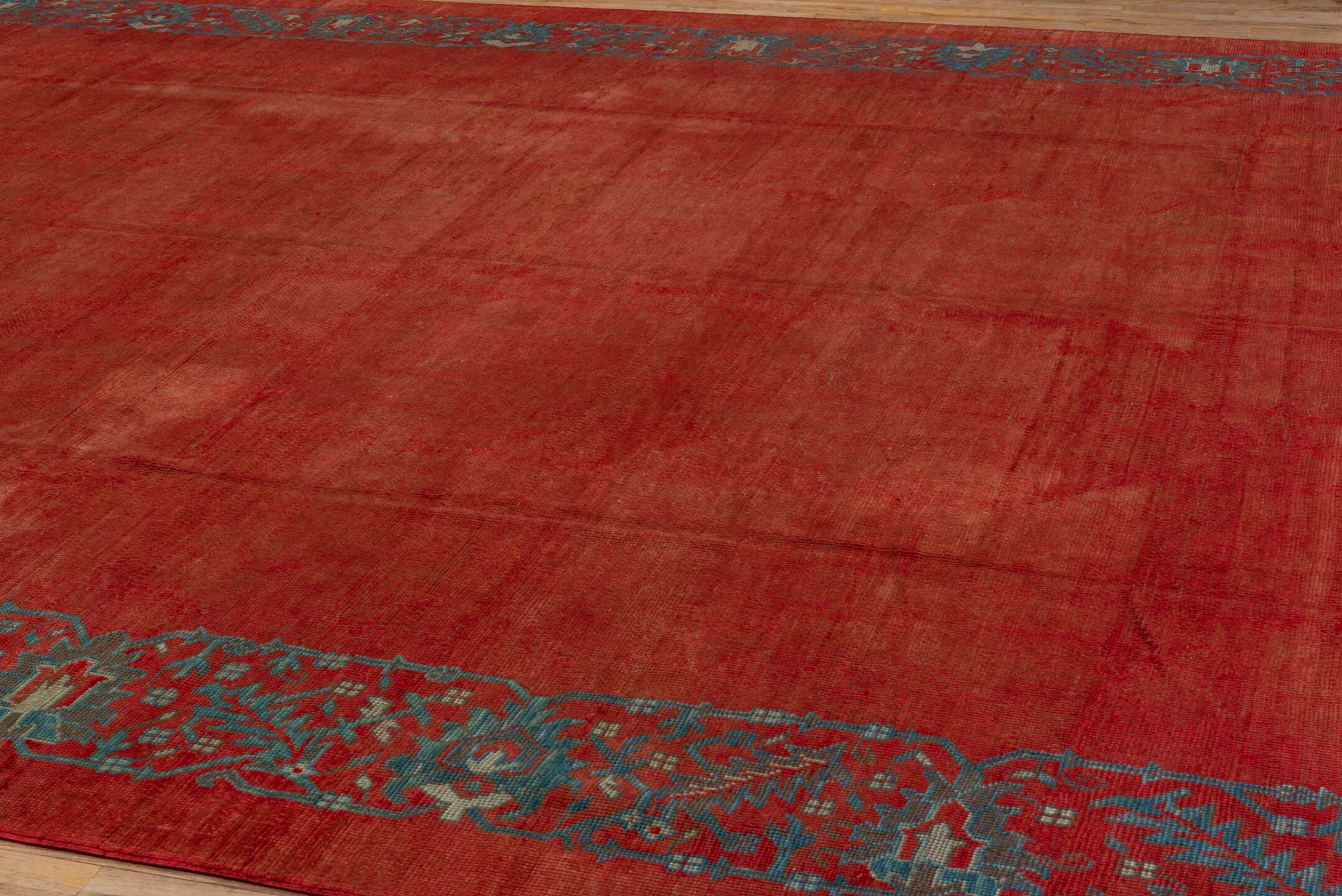12' x 16' one-of-a-kind handmade antique Oushak oversize rug. Color palette: rust, terra cotta, slate, blue, brick, taupe