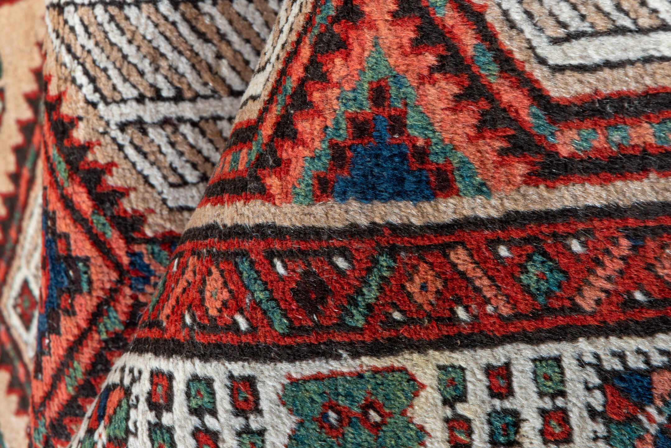 2' x 14' one-of-a-kind handmade vintage Sarab runner rug. Color palette: ivory, rust, navy, camel, crimson, charcoal