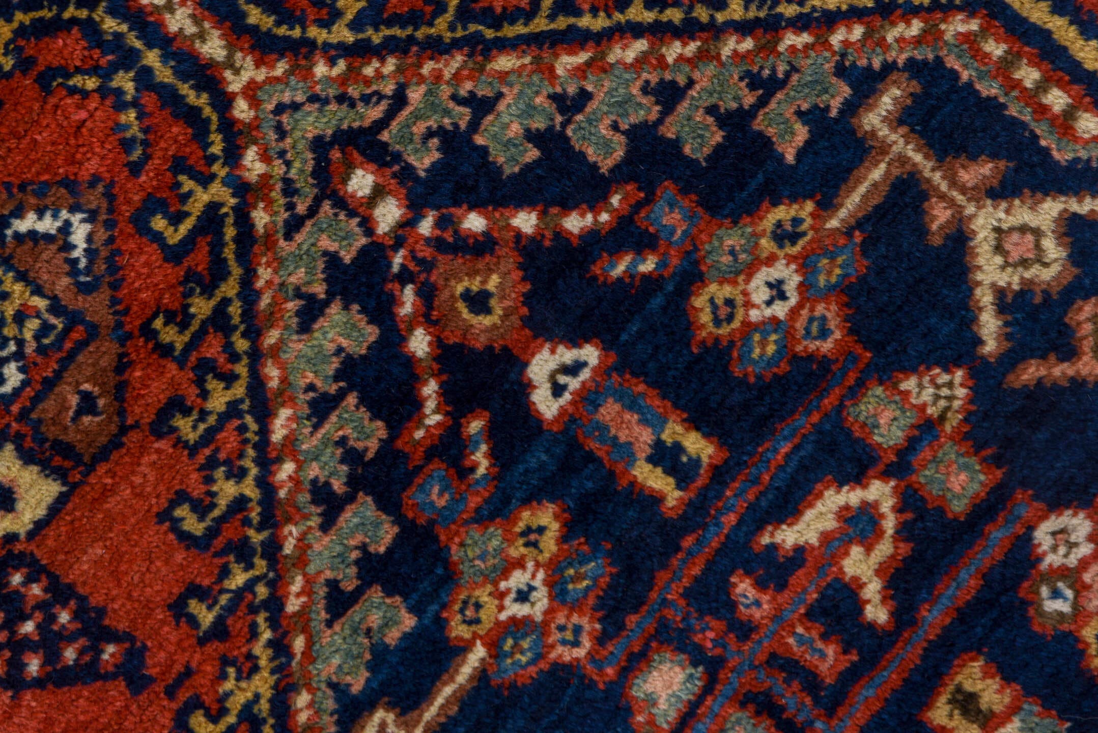 3' x 9' one-of-a-kind handmade vintage Heriz runner rug. Color palette: rust, navy, ivory, cobalt, camel, rose, terracotta