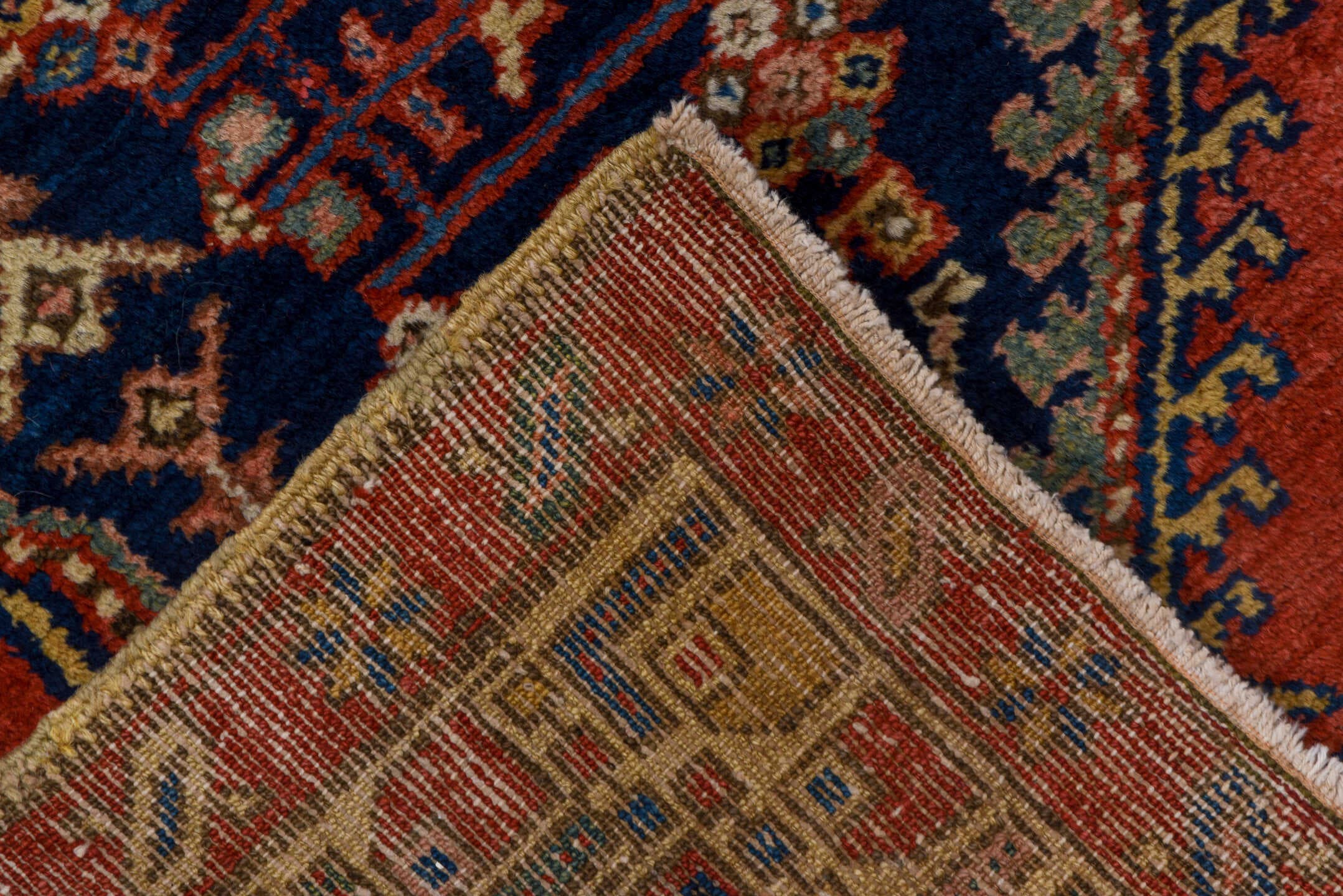 3' x 9' one-of-a-kind handmade vintage Heriz runner rug. Color palette: rust, navy, ivory, cobalt, camel, rose, terracotta