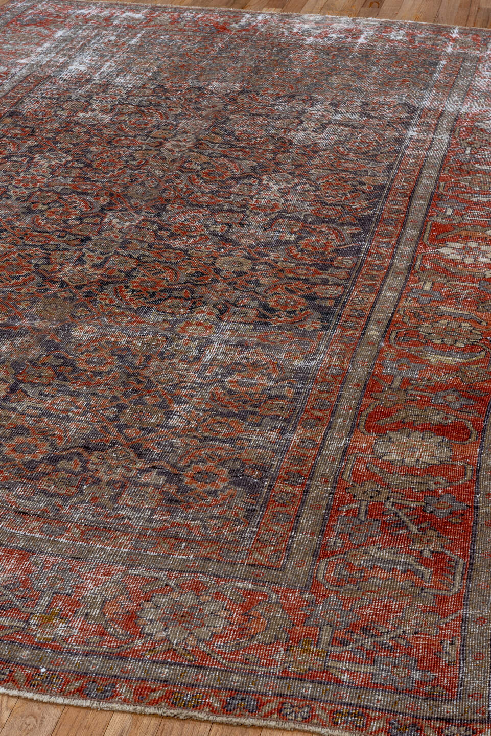 5' x 8' one-of-a-kind handmade antique Mahal medium size rug. Color palette: rust, charcoal, taupe, ivory, terra cotta