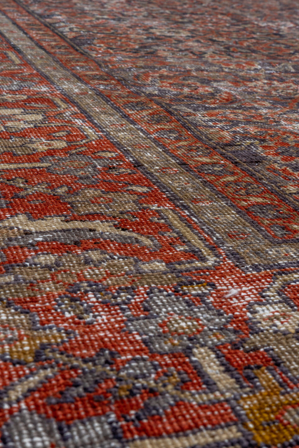 5' x 8' one-of-a-kind handmade antique Mahal medium size rug. Color palette: rust, charcoal, taupe, ivory, terra cotta