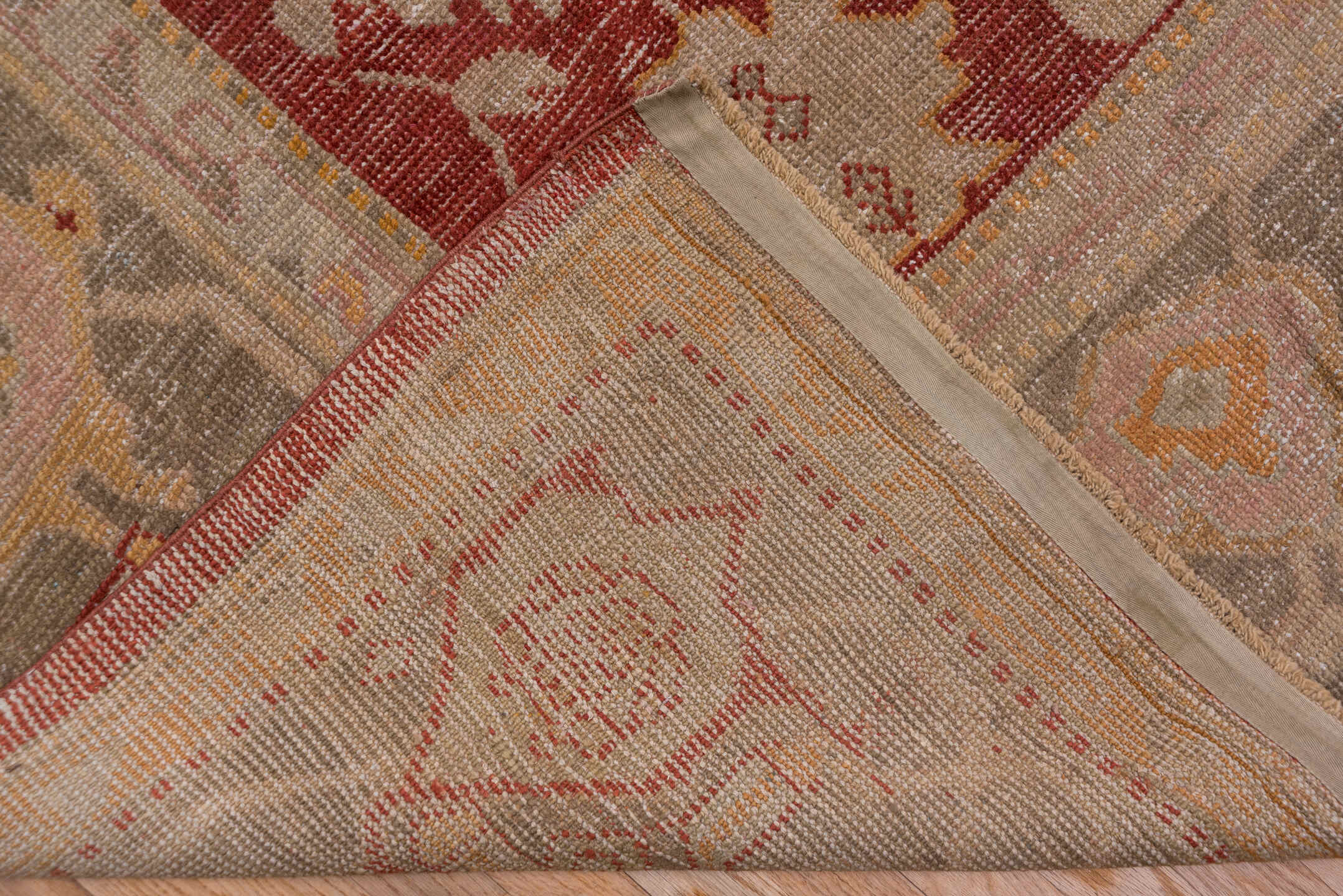 12' x 15' one-of-a-kind handmade antique Oushak oversize rug. Color palette: rust, taupe, ivory, sage, gold, terra cotta