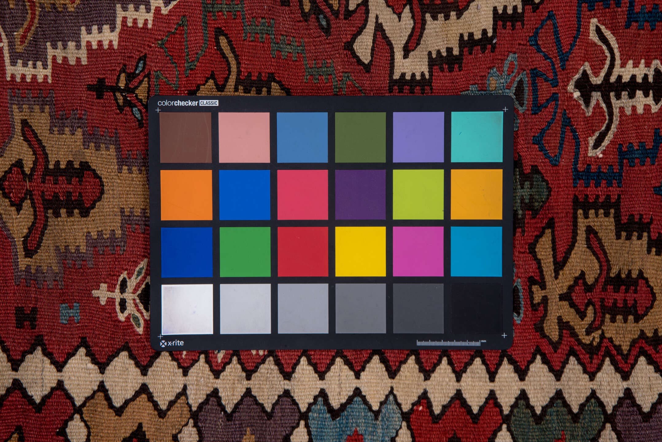 5' x 13' one-of-a-kind handmade antique Kilim rug. Color palette: rust, ivory, indigo, camel, charcoal, sky blue, burgundy
