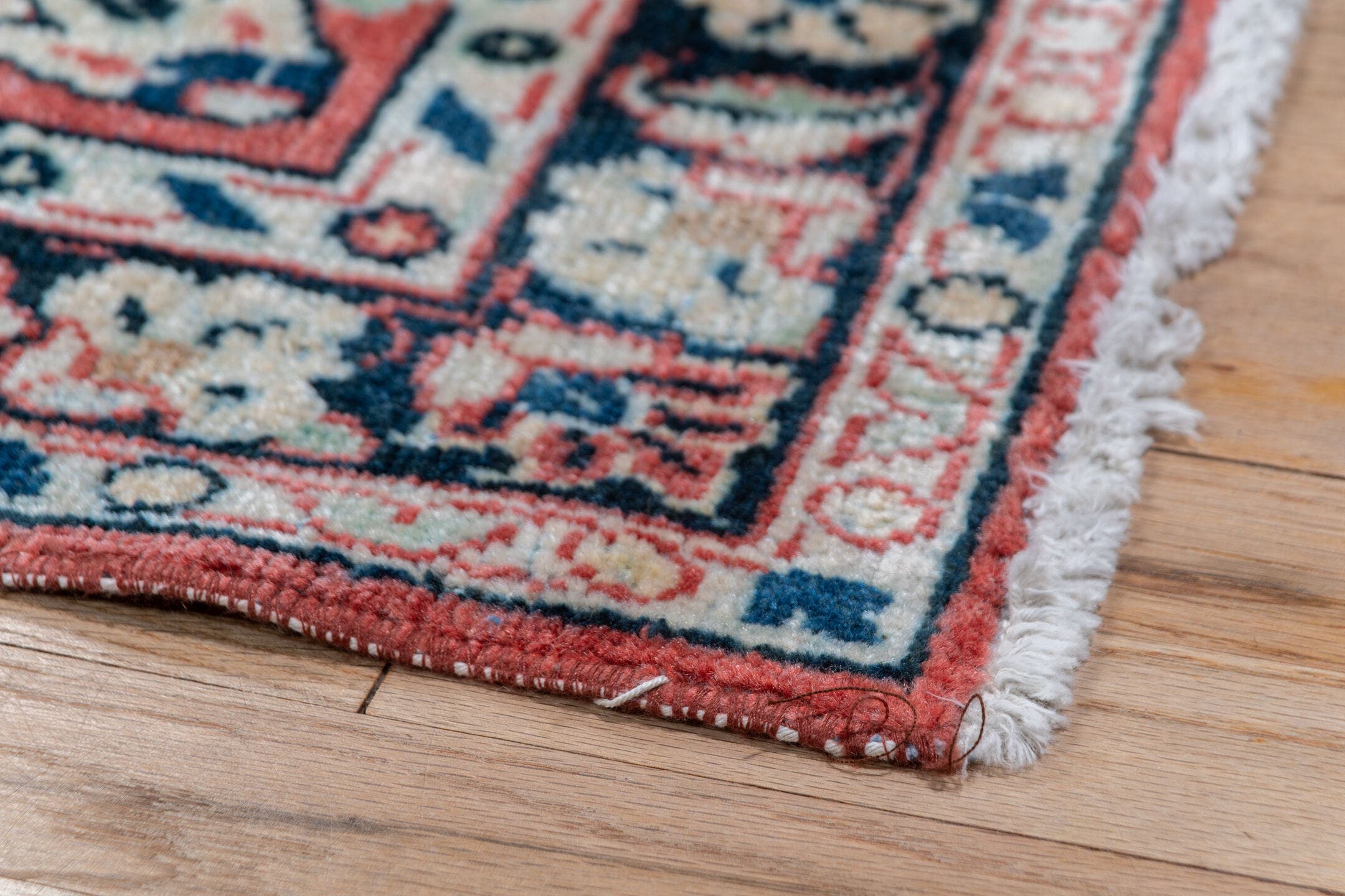 2' x 13' one-of-a-kind handmade vintage Mahal runner rug. Color palette: coral, ivory, navy, slate, rose, charcoal