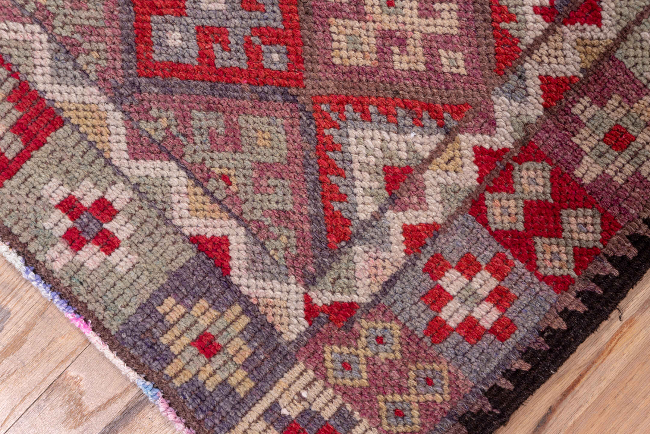 2' x 11' one-of-a-kind handmade vintage Oushak runner rug. Color palette: rose, rust, taupe, burgundy, muted blue, ivory